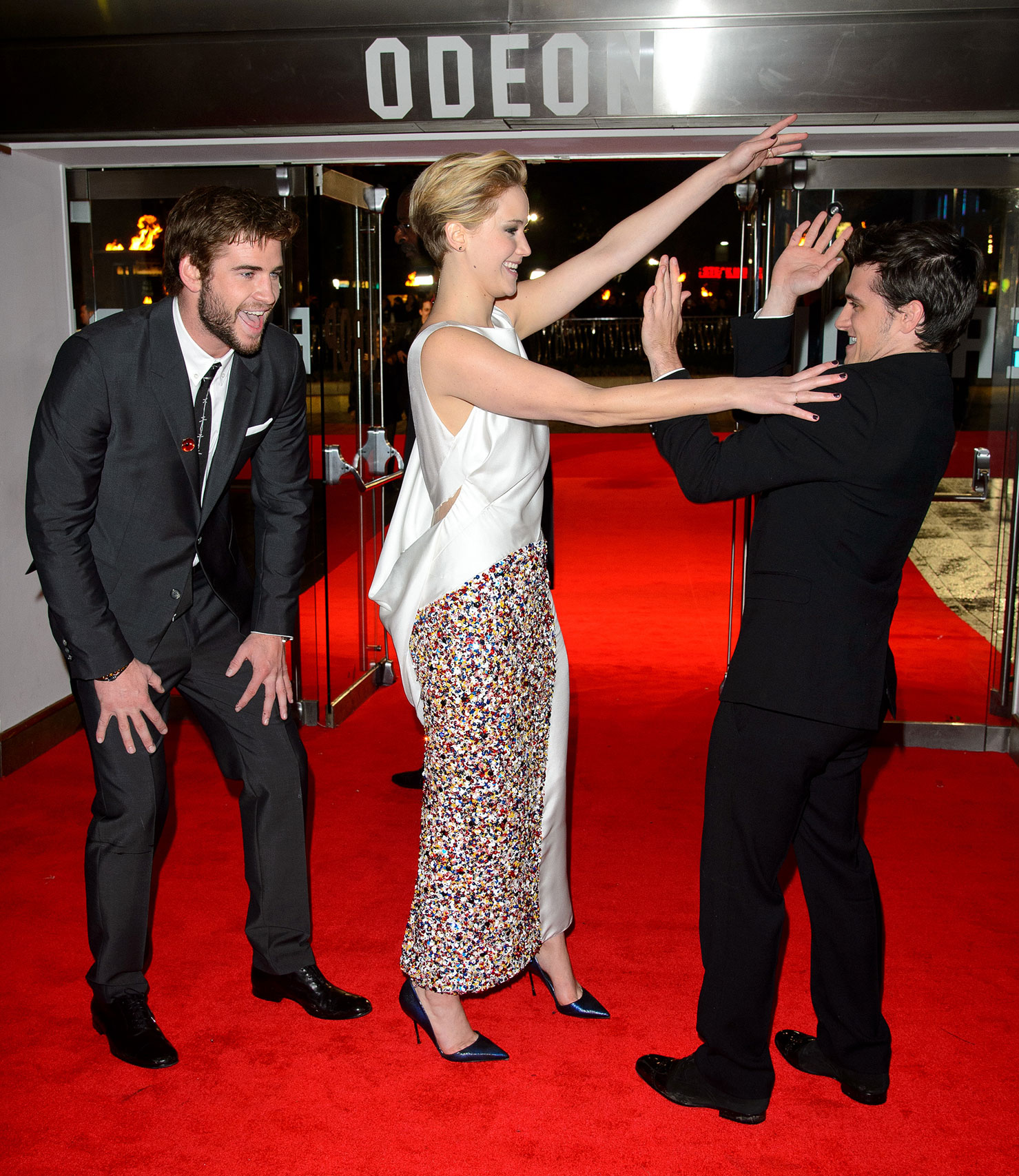Liam Hemsworth, Jennifer Lawrence and Josh Hutcherson at the UK Premiere of  The Hunger Games: Catching Fire  on November 11, 2013 in London, England.