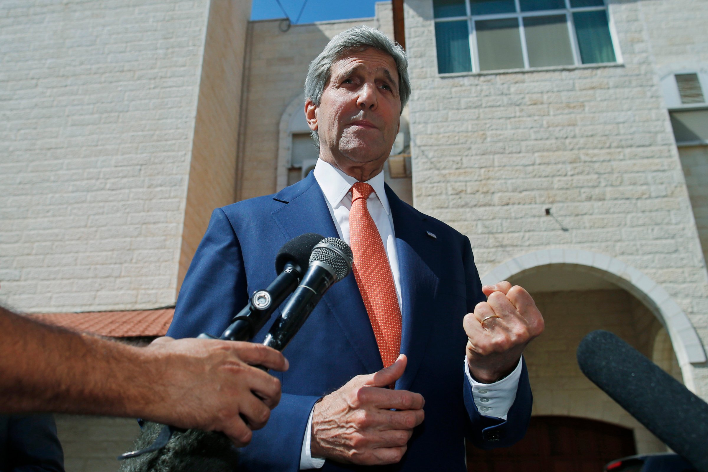 U.S. Secretary of State John Kerry speaks to reporters after meeting with Palestinian President Mahmoud Abbas in the West Bank city of Ramallah on July 23, 2014.