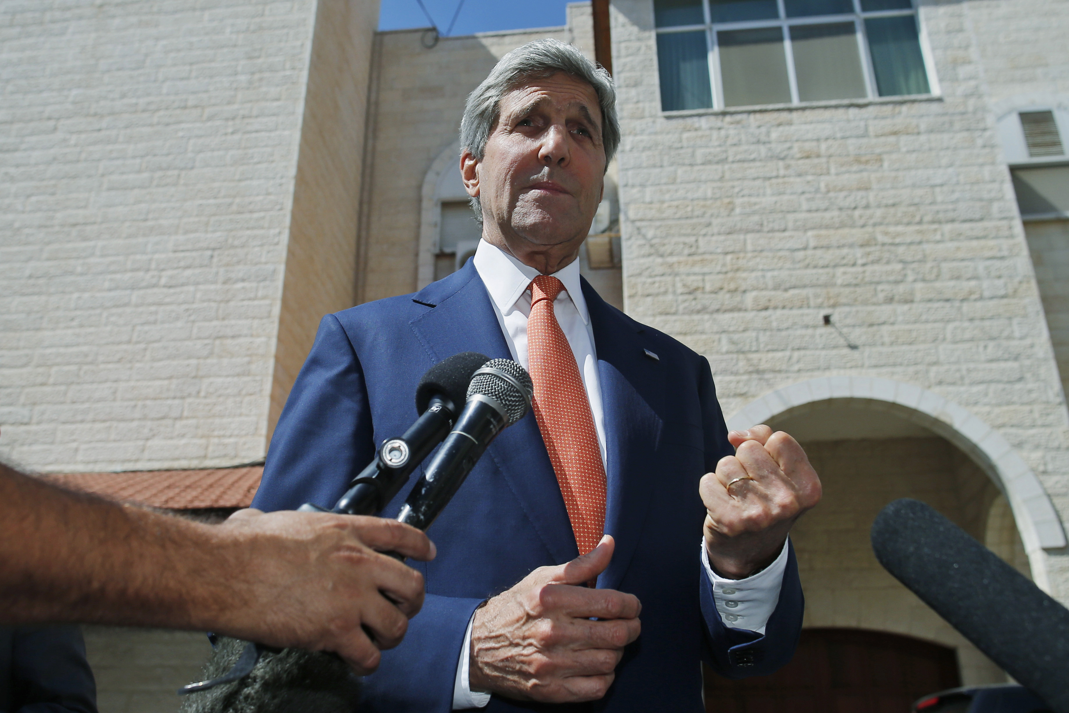 U.S. Secretary of State John Kerry speaks to reporters after meeting with Palestinian President Mahmoud Abbas in the West Bank city of Ramallah on July 23, 2014. (AP)