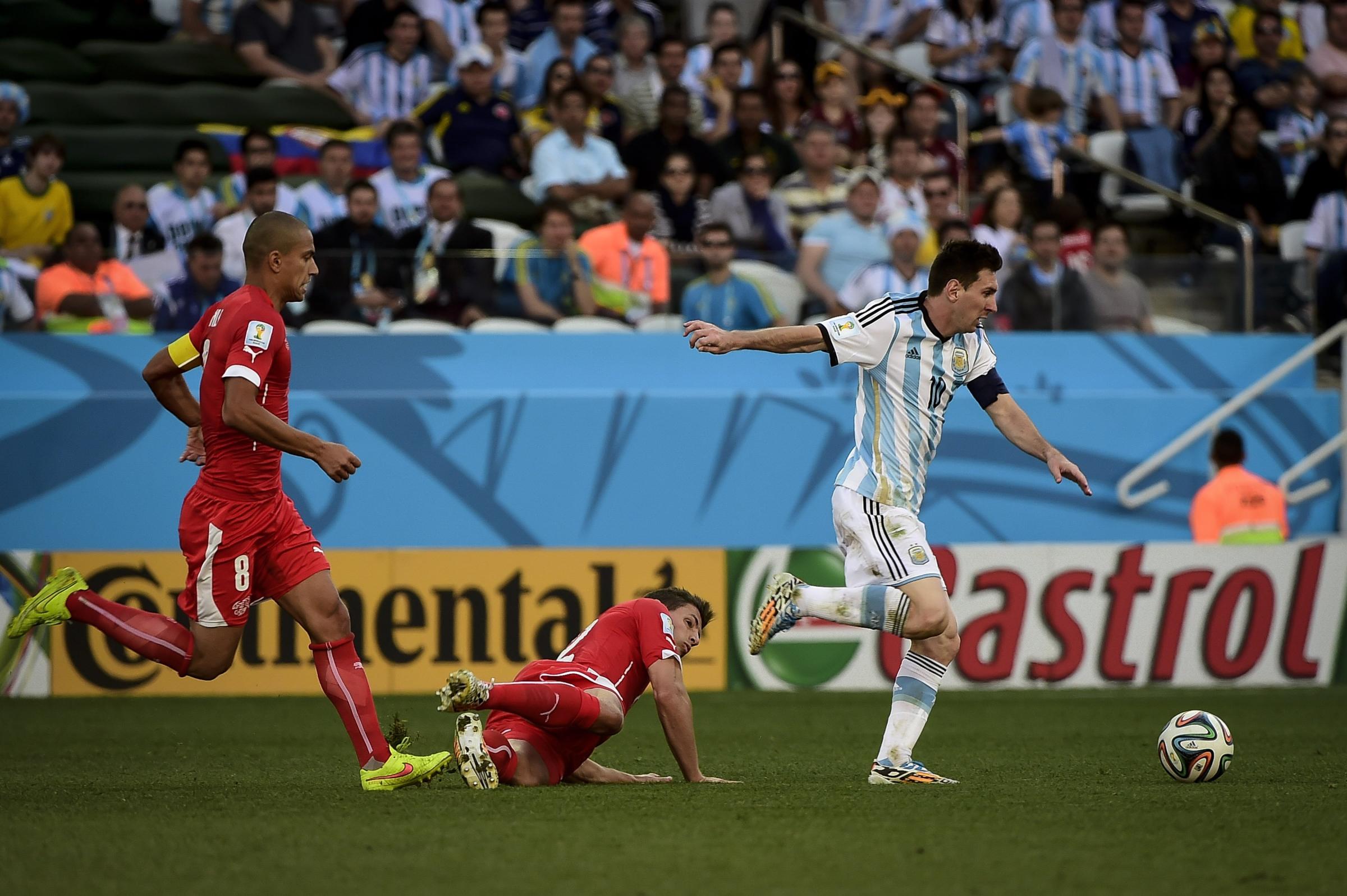 Lionel Messi (10) carries the ball through the midfiel during the Round of 16 of the 2014 World Cup, between Argentina and Switzerland, on July 1st, in Sao Paulo, Brazil.
