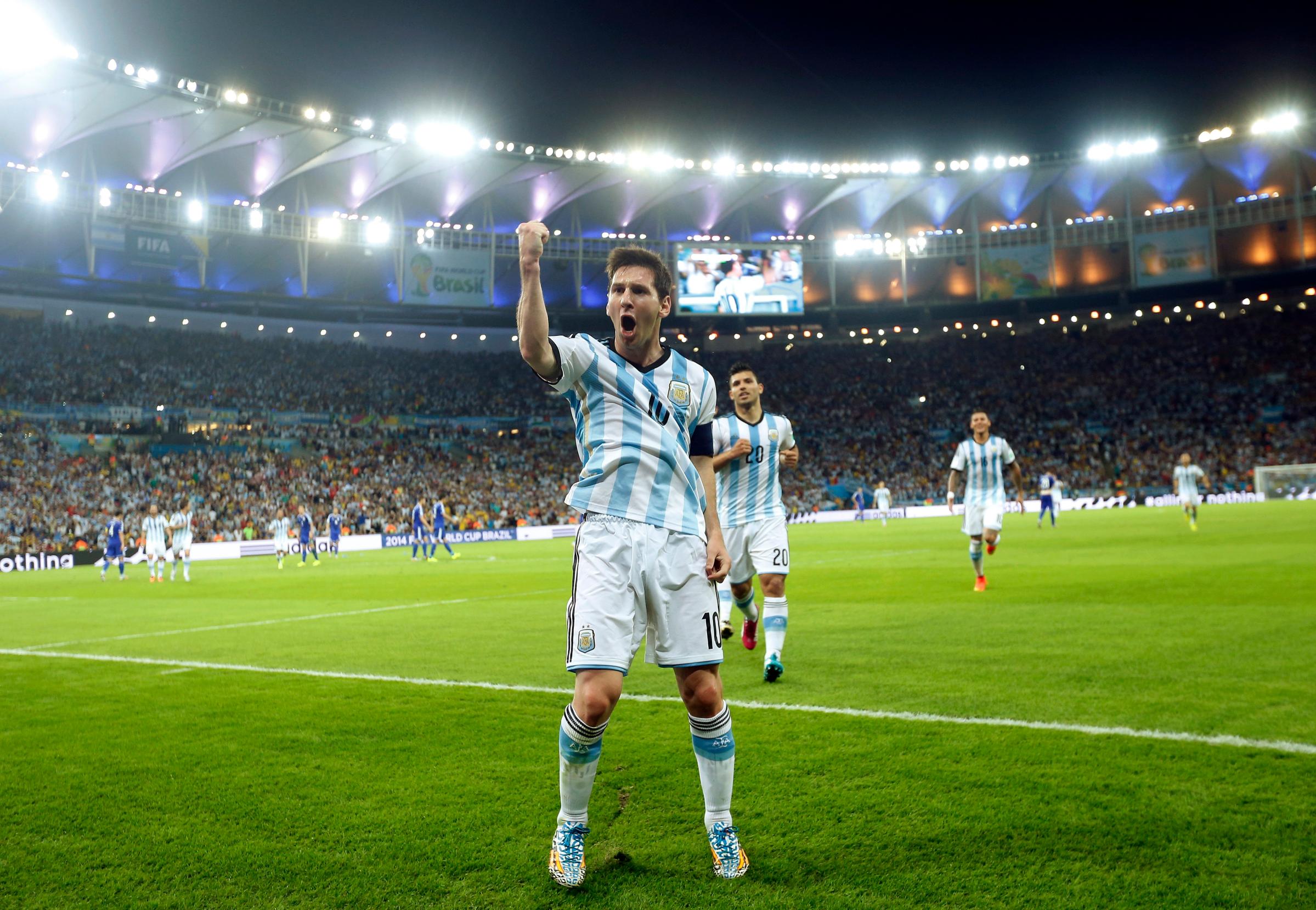 Argentina's Lionel Messi celebrates scoring his side's second goal during the group F World Cup soccer match between Argentina and Bosnia at the Maracana Stadium in Rio de Janeiro, Brazil, on June 15, 2014.