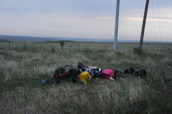 Luggages are pictured on July 17, 2014 on the site of the crash of the malaysian airliner carrying 295 people from Amsterdam to Kuala Lumpur, near the town of Shaktarsk, in rebel-held east Ukraine.
