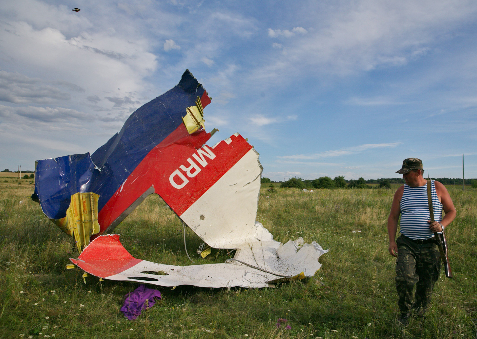 A pro-Russian separatist seen at the crash site of a Malaysia Airlines Flight 17, near the village of Grabovo, July 23, 2014.