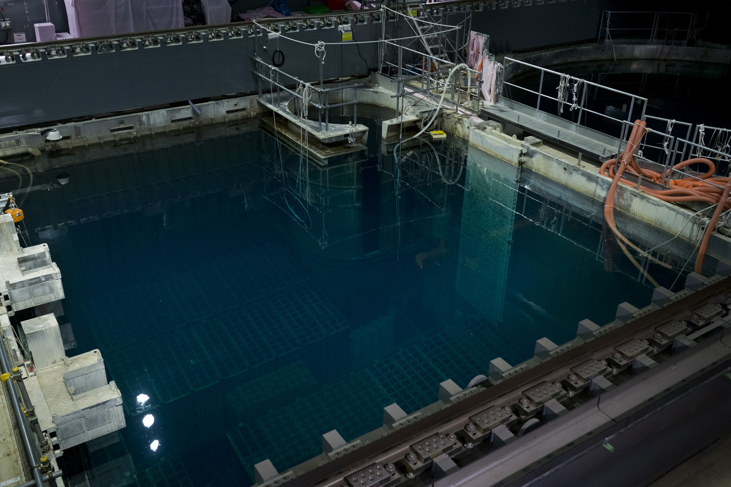 Japan, Okuma, 2014. TEPCO has made efforts to remove spent fuel rods from reactor 4. Reactor 4 did not melt down, but the 9.0 magnitude earthquake caused extensive damage to its foundations.