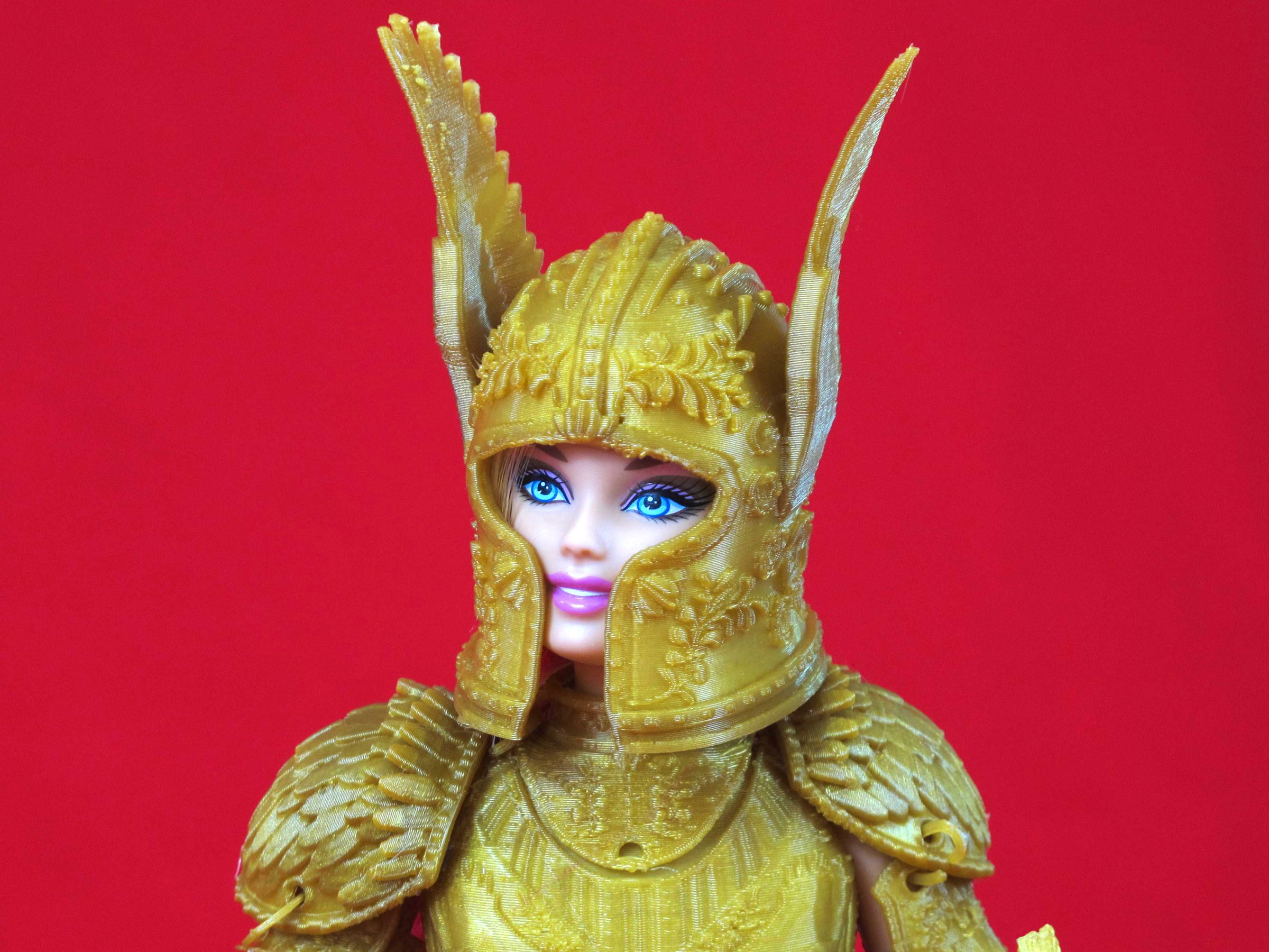 The helmet of the gold suit of armor in the "Faire Play" battle set. A rose garden pattern is repeated throughout the armor.