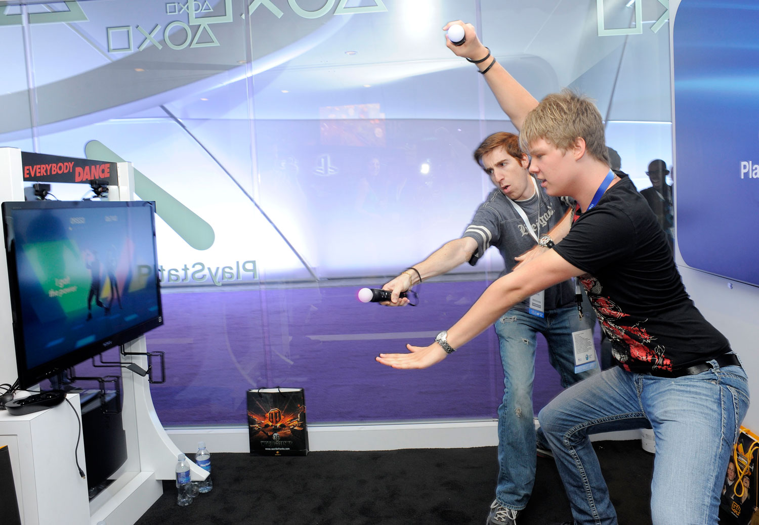 Gamers play with the Playstation Move at the Electronic Entertainment Expo (E3), in Los Angeles on June 9, 2011.