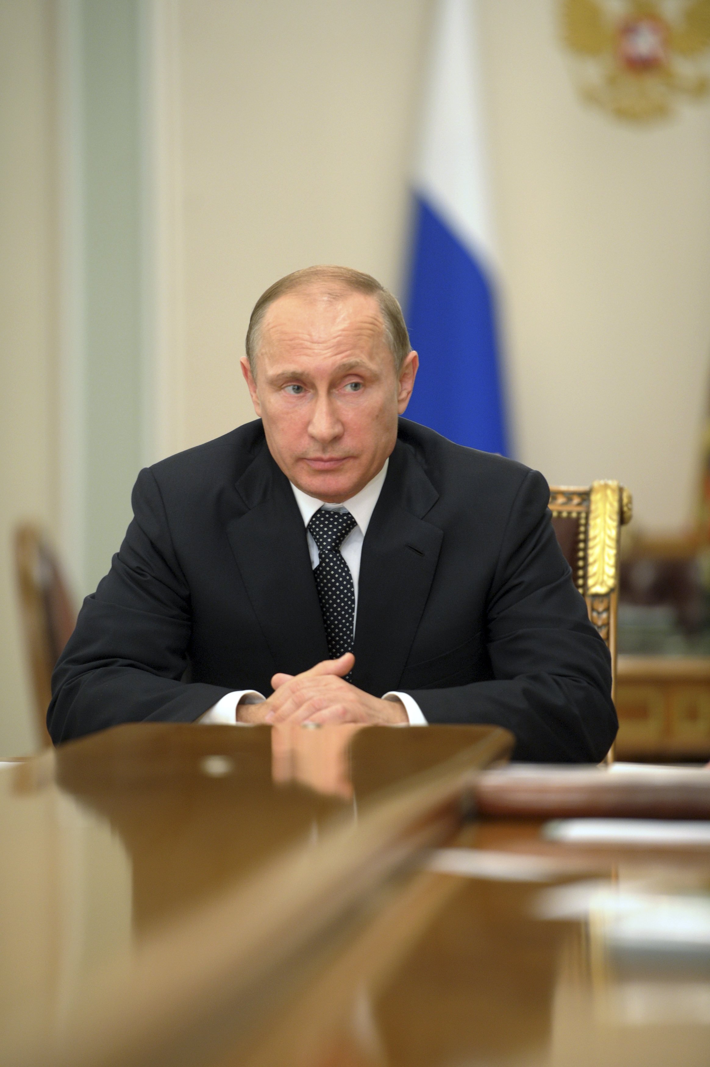 Russia's President Vladimir Putin chairs a meeting at the Novo-Ogaryovo state residence outside Moscow on July 17, 2014.