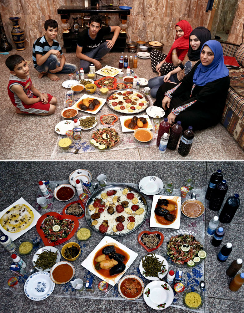 A Muslim family waits to break their fast in Baghdad on July 6, 2014.