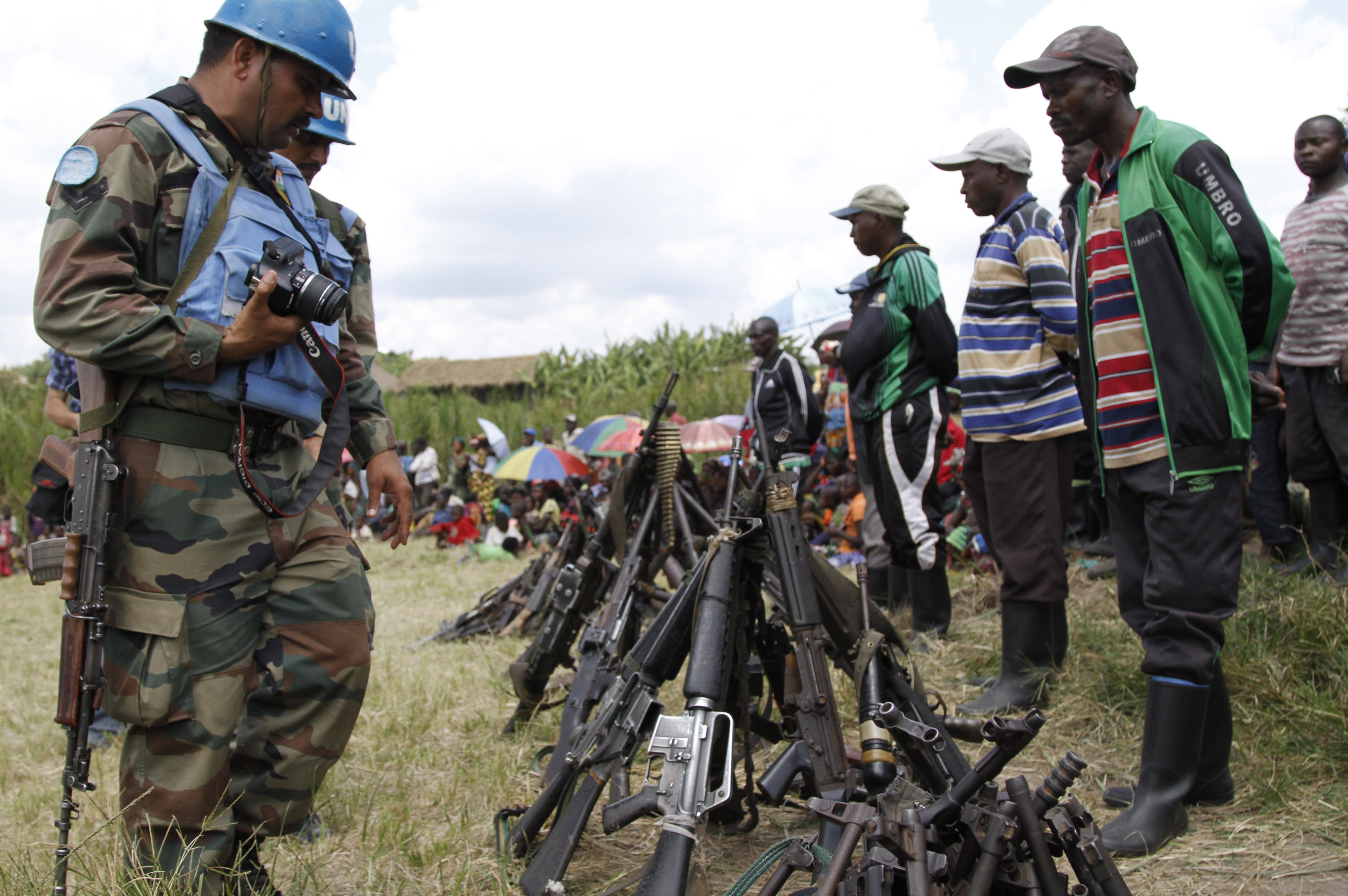 United Nations peace keepers record details of weapons recovered from the Democratic Forces for the Liberation of Rwanda (FDLR) militants after their surrender in Kateku