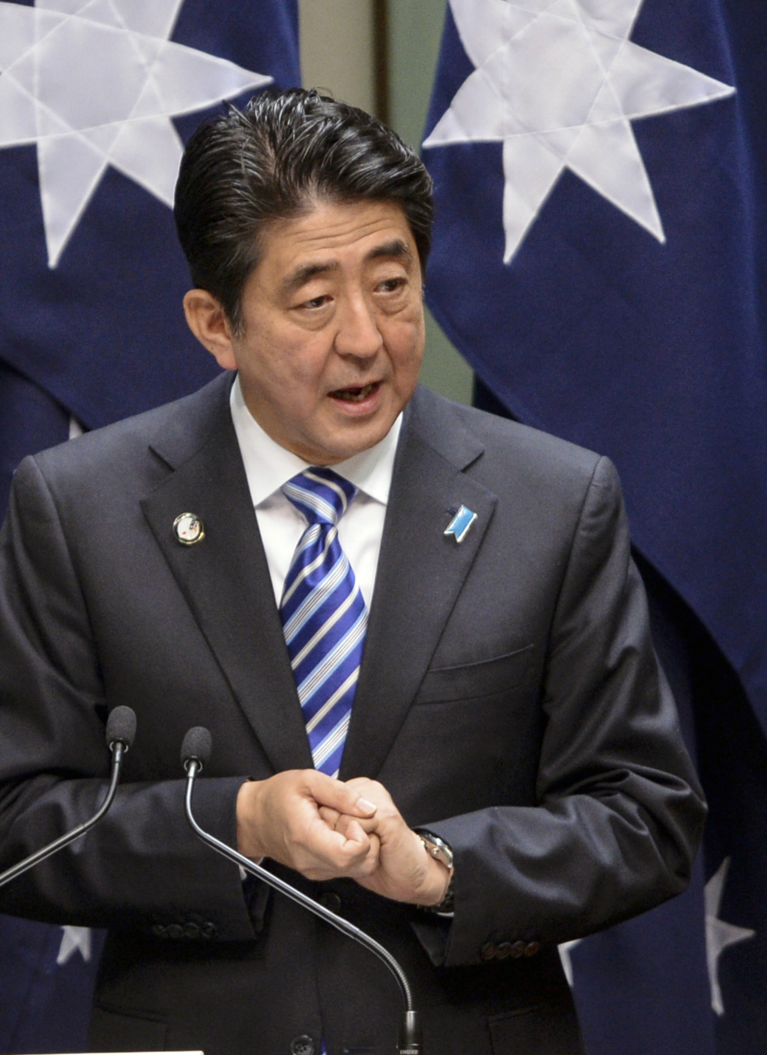 Japan's PM Abe delivers an address to both houses of parliament in Australia's House of Representatives chamber at Parliament House in Canberra