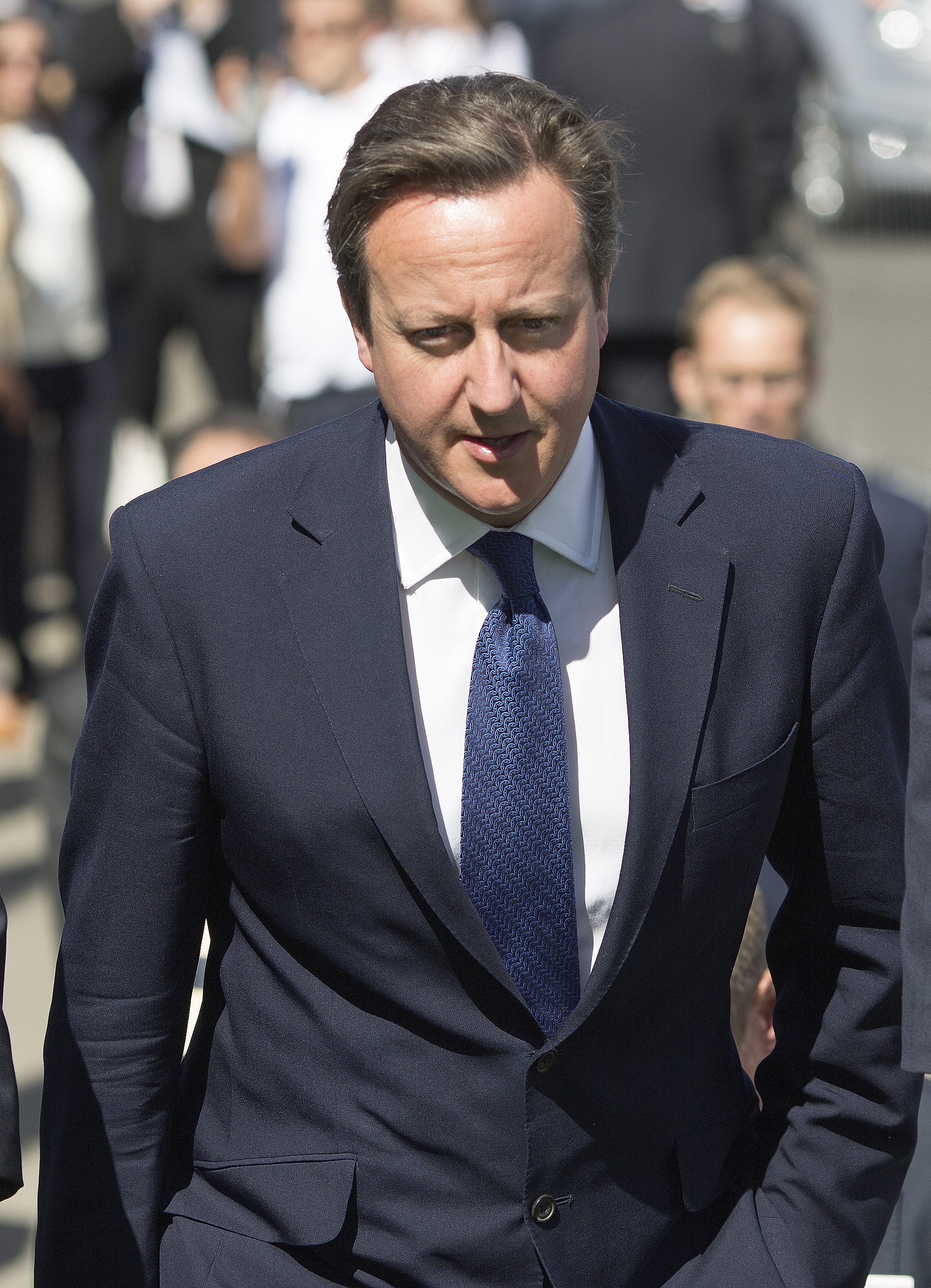 Britain's Prime Minister David Cameron arrives to officially open the 2014 Farnborough International Airshow, in southern England, on July 14, 2014 (Kieran Doherty—Reuters)