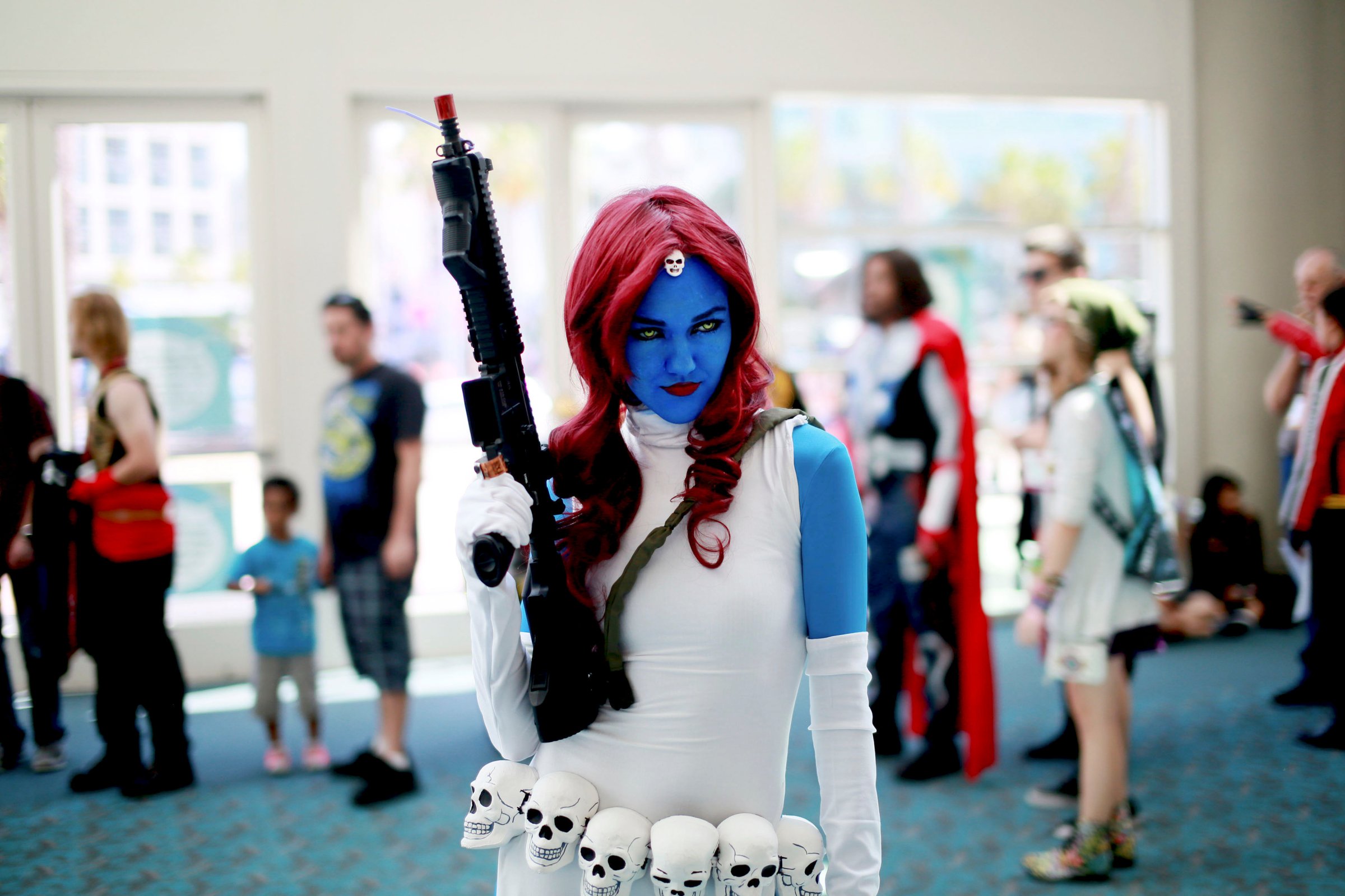 Allie Shaughnessy, who is dressed as Mystique, poses during the 2014 Comic-Con International Convention in San Diego, California