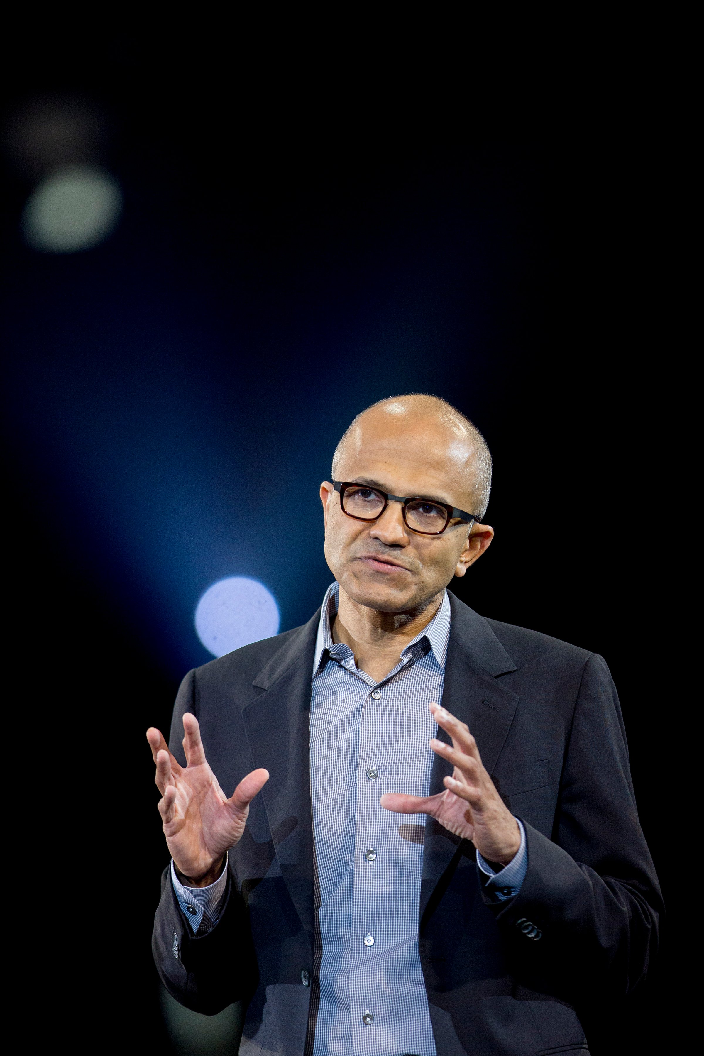 Satya Nadella, chief executive officer of Microsoft Corp., speaks during a keynote session at the Microsoft Worldwide Partner Conference in Washington on July 16, 2014.