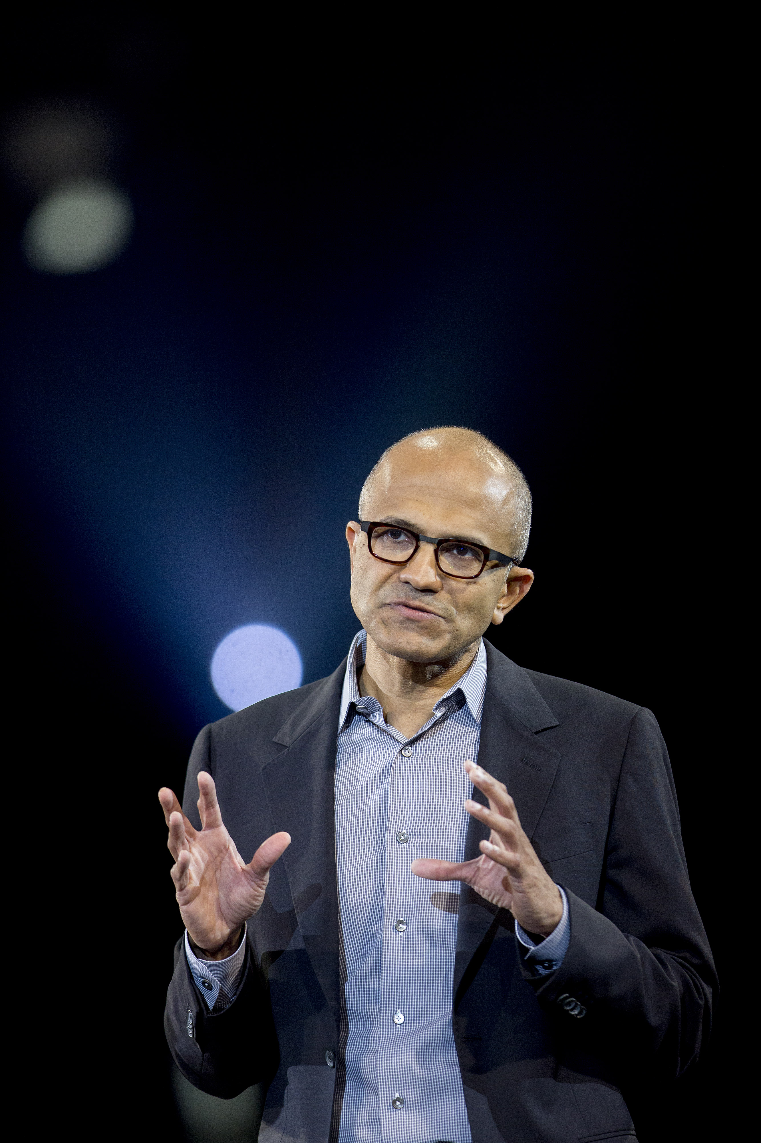 Satya Nadella, chief executive officer of Microsoft Corp., speaks during a keynote session at the Microsoft Worldwide Partner Conference in Washington on July 16, 2014. (Bloomberg/Getty Images)