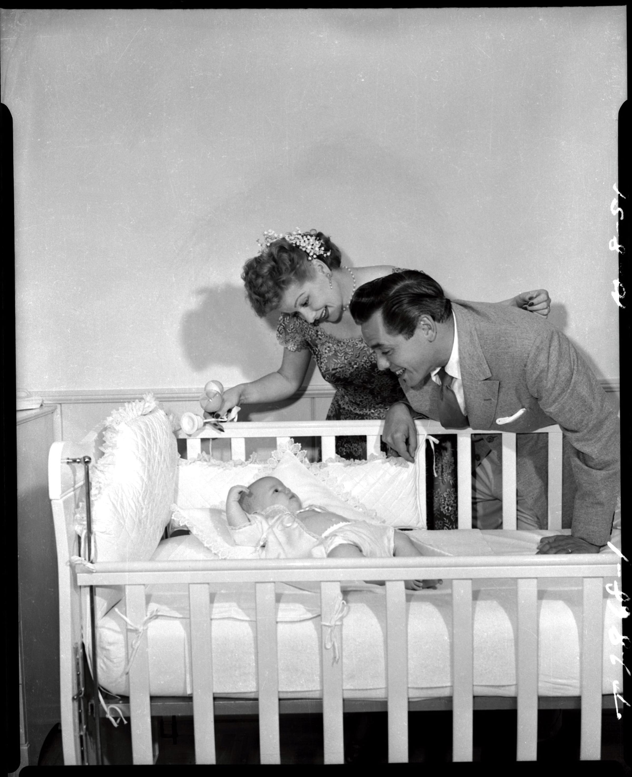 "I Love Lucy" promotional shot of Lucille Ball and Desi Arnaz and their child, Lucy Desiree Arnaz.