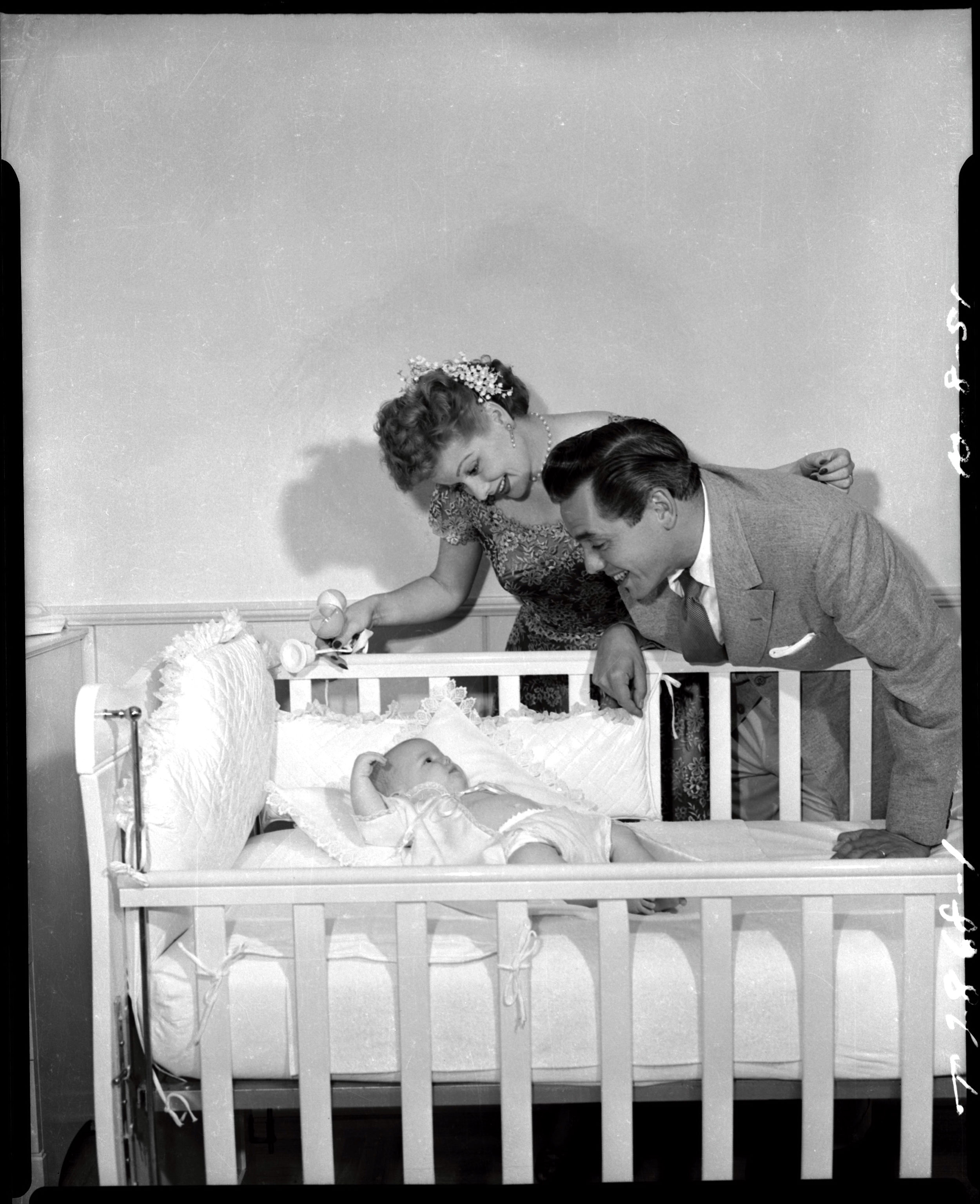 "I Love Lucy" promotional shot of Lucille Ball and Desi Arnaz and their child, Lucy Desiree Arnaz. (CBS Photo Archive/Getty Images)