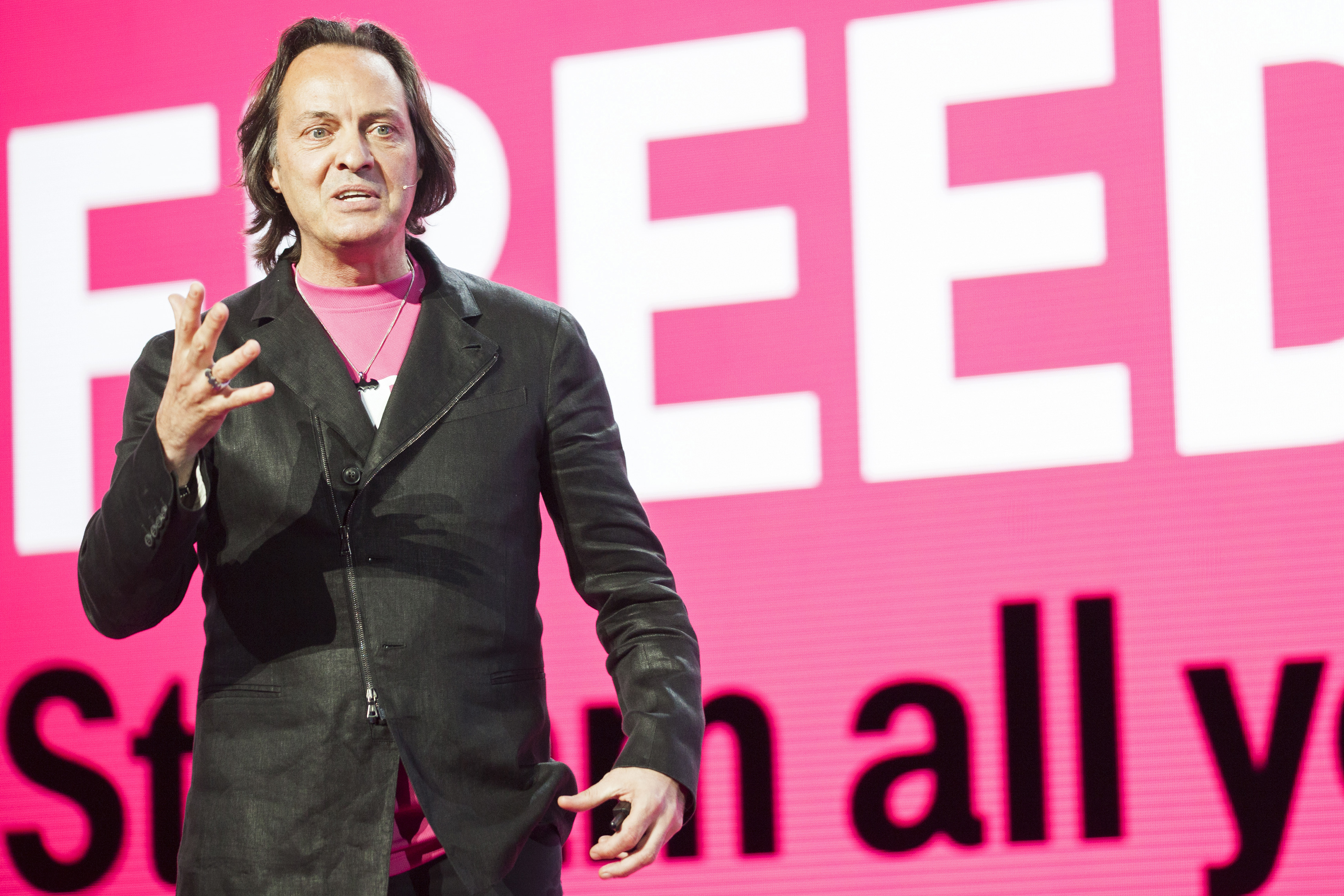 John Legere, chief executive officer of T-Mobile US Inc., speaks during an event in Seattle, Washington, U.S., on Wednesday, June 18, 2014. (Bloomberg/ Getty Images)