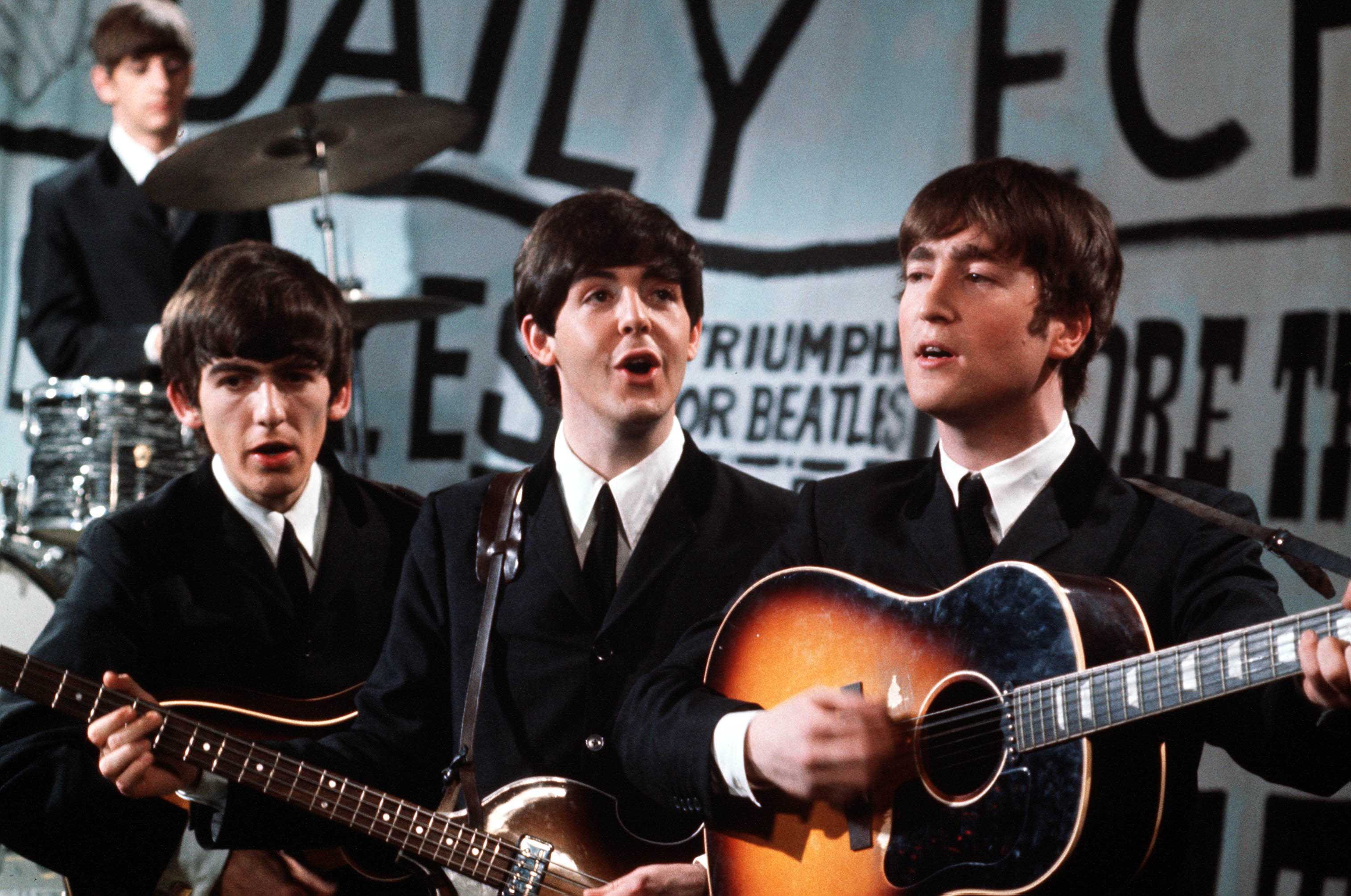 The phenomenon that was the Beatles, Left to Right: Ringo Starr on drums, George Harrison on guitar, Paul McCartney on bass and vocals, and John Lennon on acoustic guitars and vocals, 1963. (Bob Thomas—Getty Images)