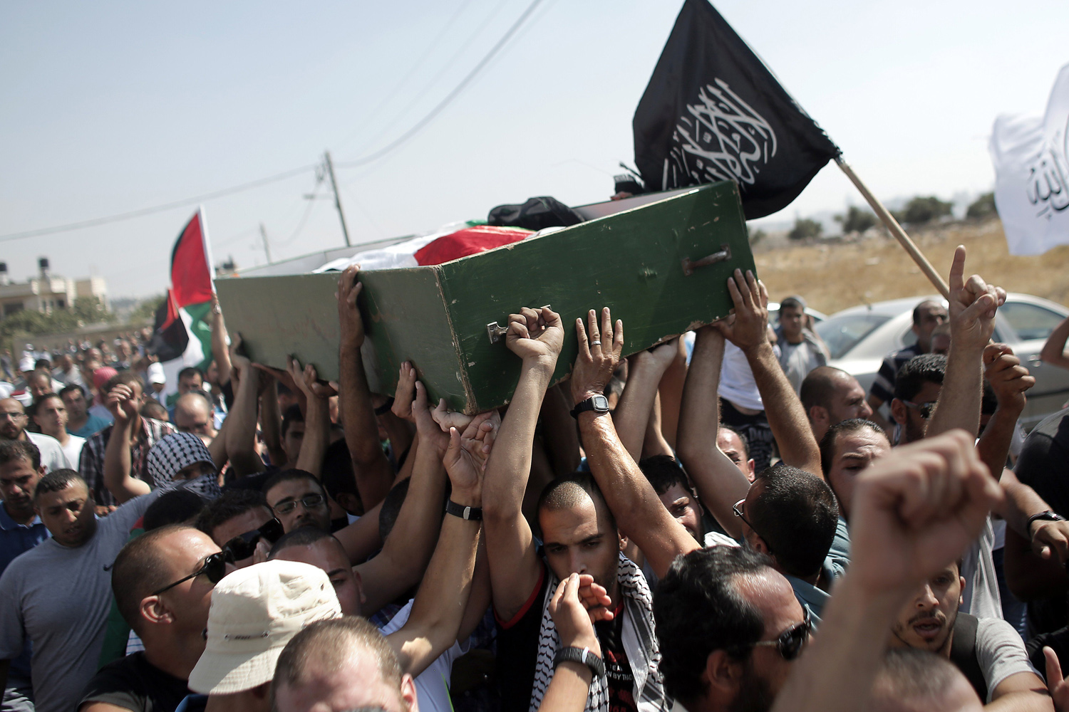 TOPSHOTS-PALESTINIAN-ISRAEL-CONFLICT-KIDNAPPING-FUNERAL