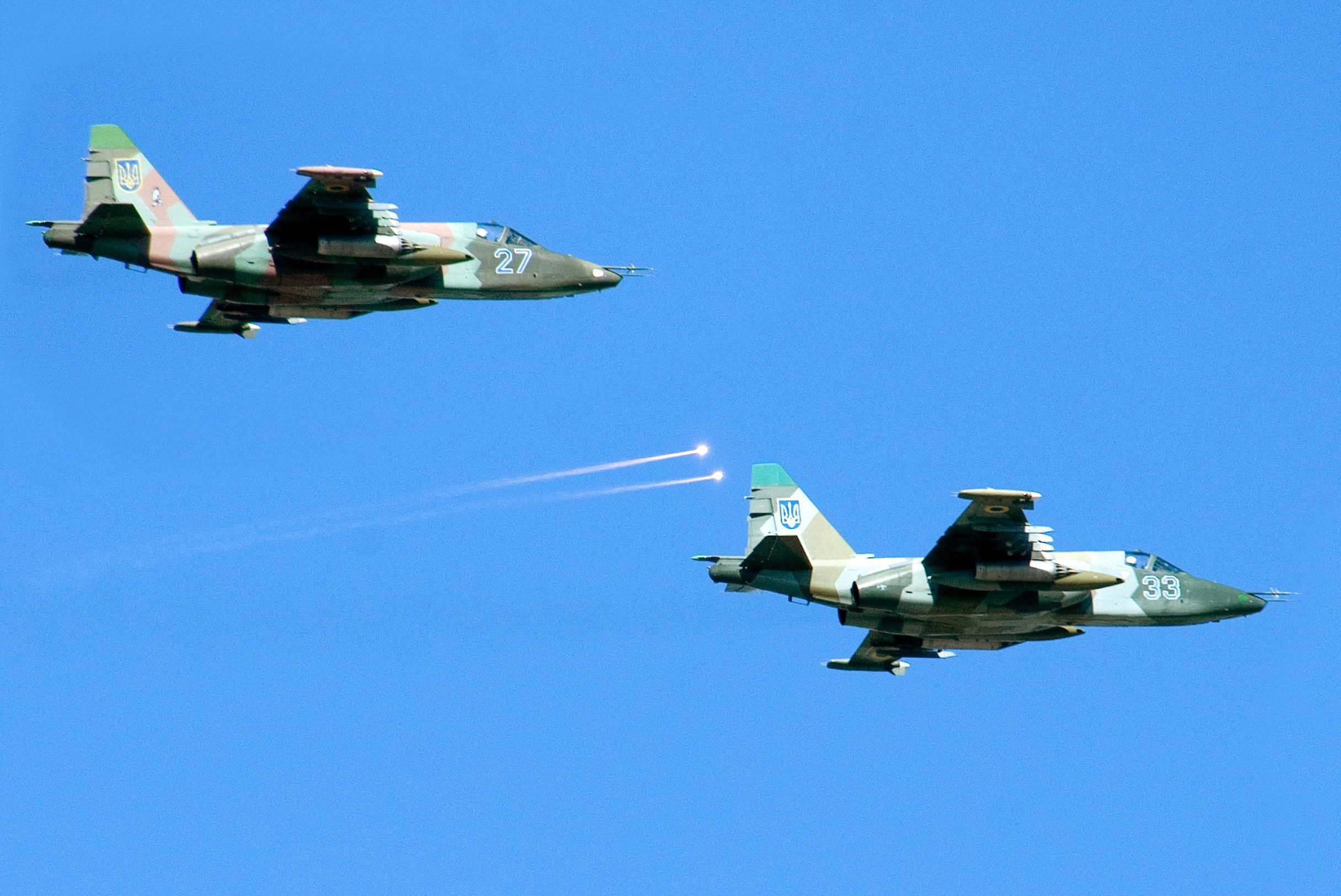 A file picture dated September 17, 2007 shows Ukrainian Su-25 attack planes during manoeuvres at the landfill in Rovno, Ukraine. Pro-Russian separatists have shot down two Ukrainian military jets in the east of the country, Defence Ministry spokesman Oleksiy Dmytrashkivskiy said on July 23, 2014. (Sergey Popsuevich—EPA)