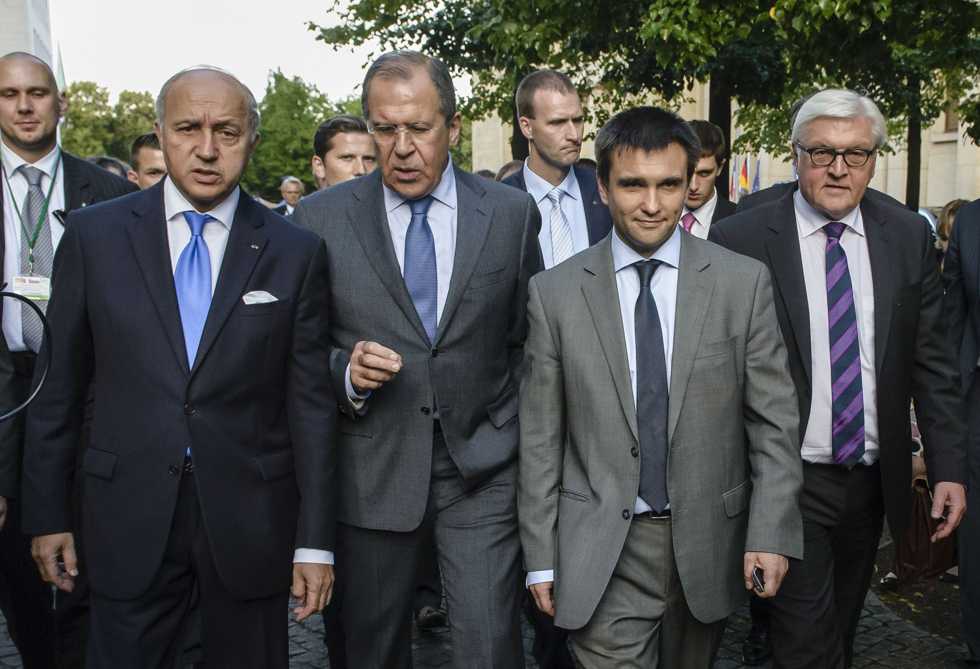 French Foreign Minister Laurent Fabius, Russian Foreign Minister Sergei Lavrov, Ukrainian Foreign Minister Pavlo Klimkin and German Foreign Minister Frank-Walter Steinmeier leave the Federal Foreign Office after a joint press conference in Berlin on July 2, 2014.