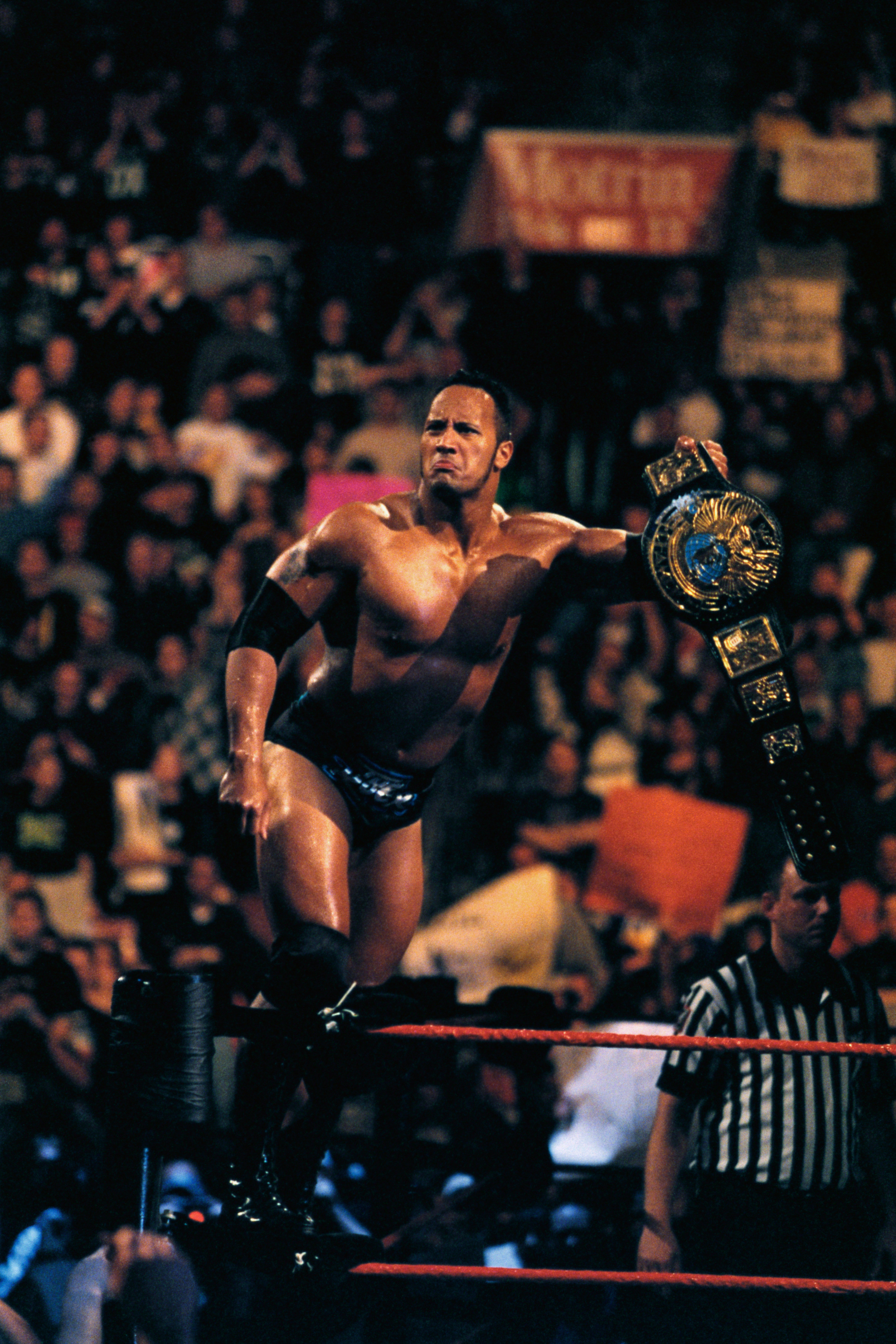 Although he's primarily an actor now, Dwayne Johnson started off his entertainment career as the professional wrestler known as The Rock. Above, he is seen holding his championship belt during the World Wrestling Federation's Wrestlemania XV at First Union Center in Philadelphia, PA, March 28, 1999.