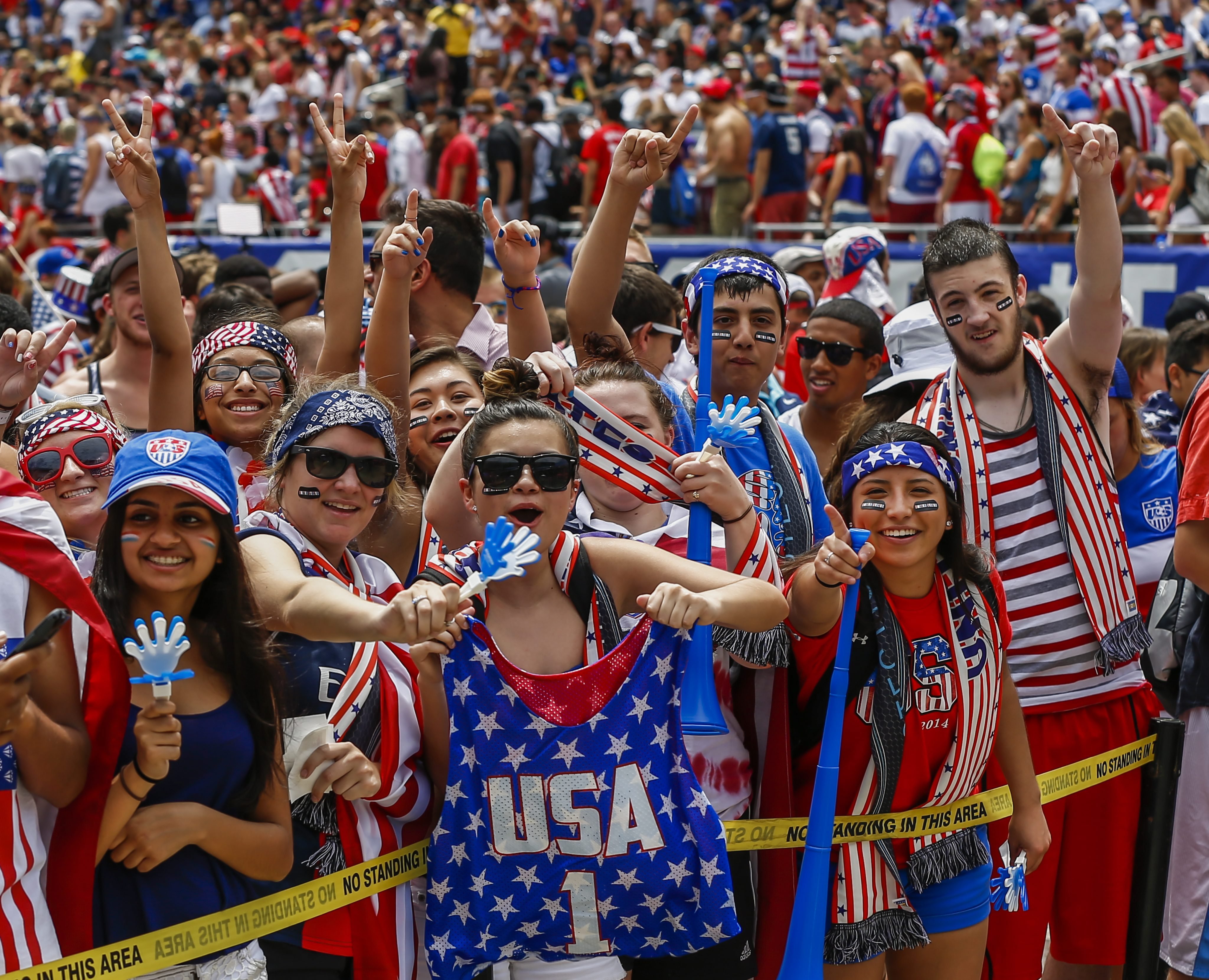 US fans cheer before the start of the FIFA World Cup Round of 16 match between the USA and Belgium played at the Arena Fonte Nova in Salvador, Brazil, at Soldier Field in Chicago, on July 1, 2014. 