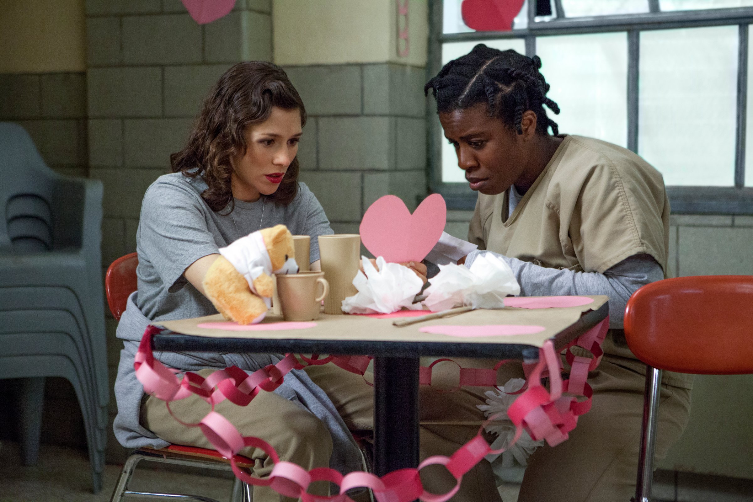 Yael Stone and Uzo Aduba in a scene from Netflix’s “Orange is the New Black” Season 2.