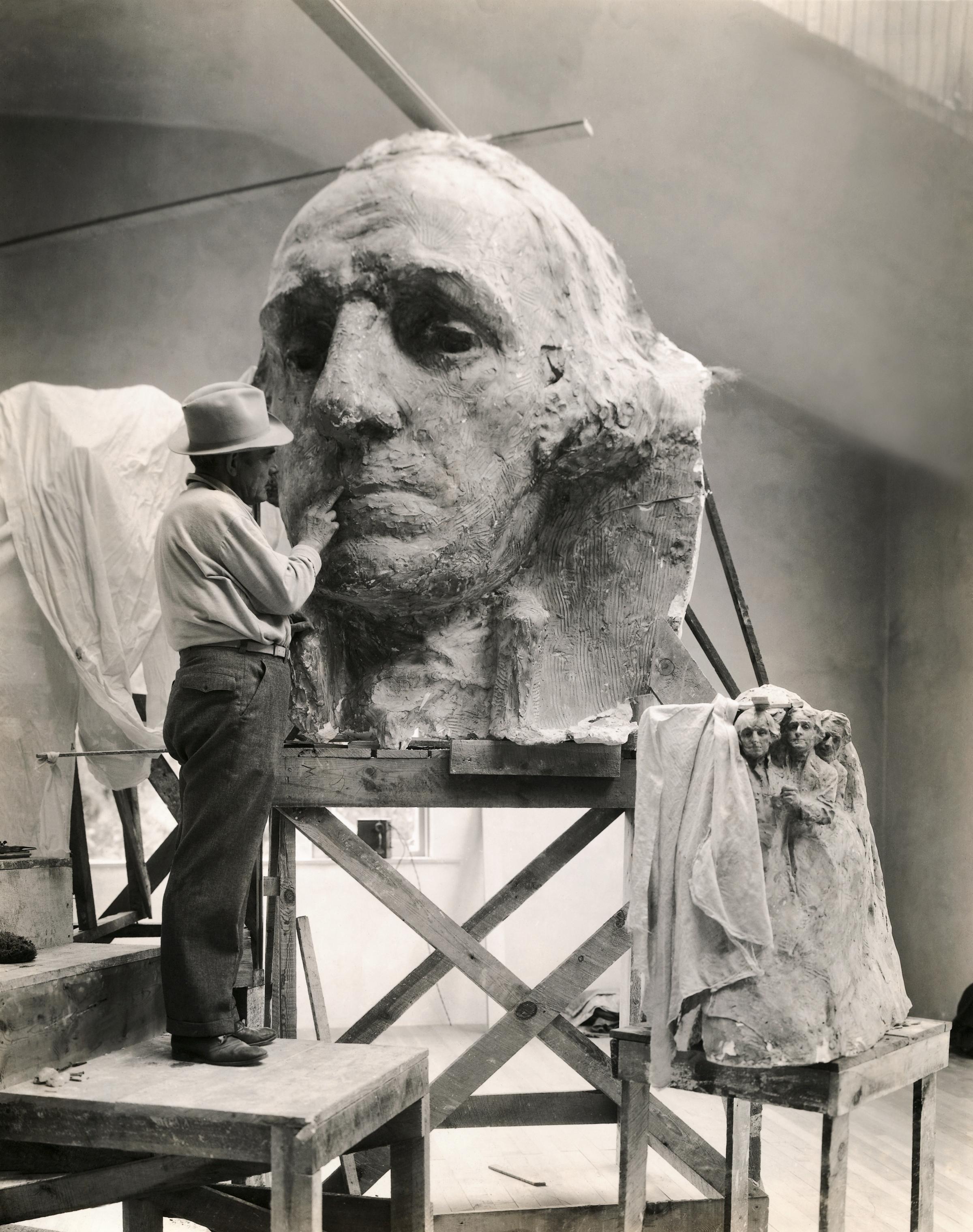 Gutzon Borglum Working on Sculpture