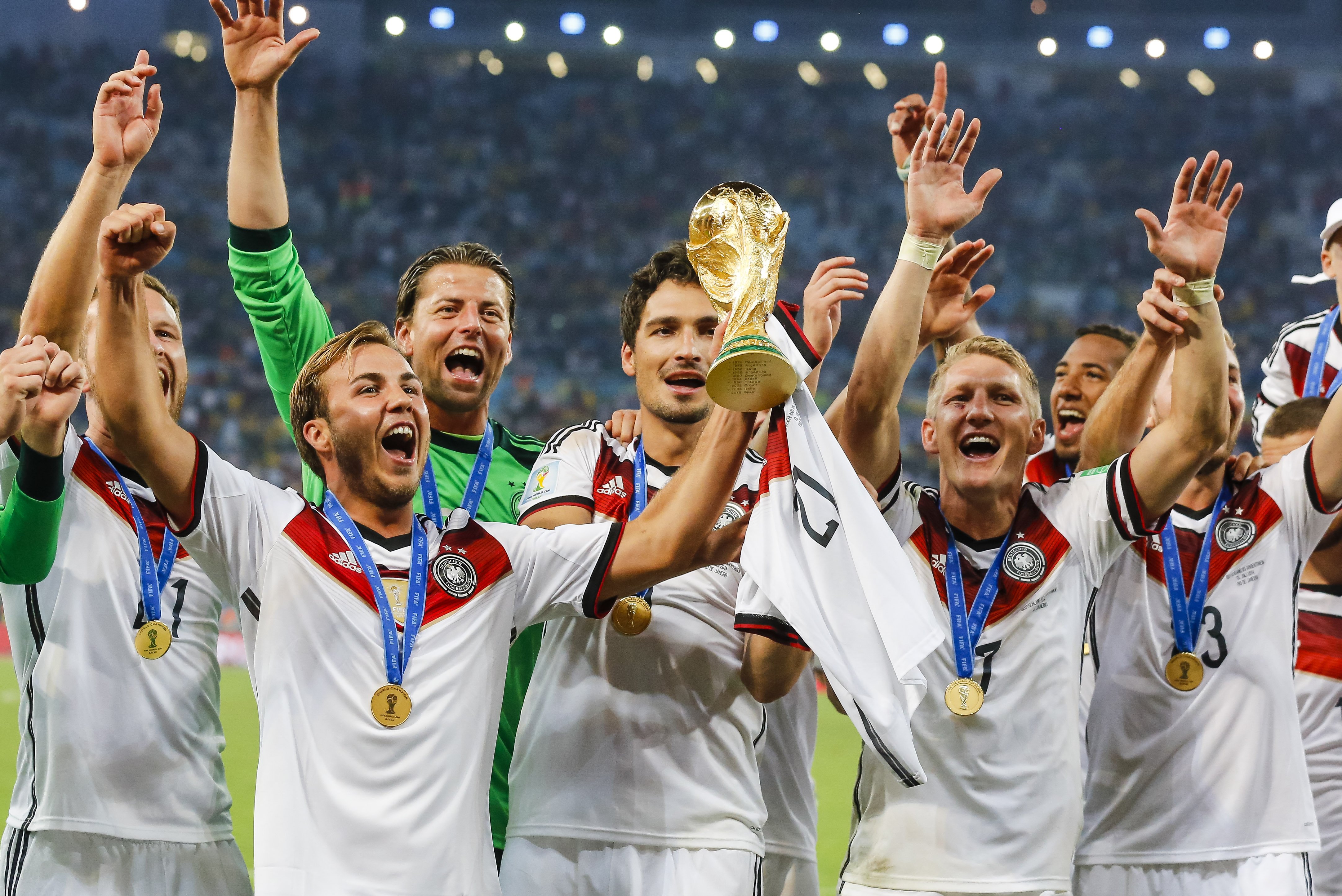 Mario Goetze of Germany holds the World Cup trophy after winning the FIFA World Cup 2014 final soccer match between Germany and Argentina at the Estadio do Maracana in Rio de Janeiro on July 13, 2014. (Action Press/Zuma Press)