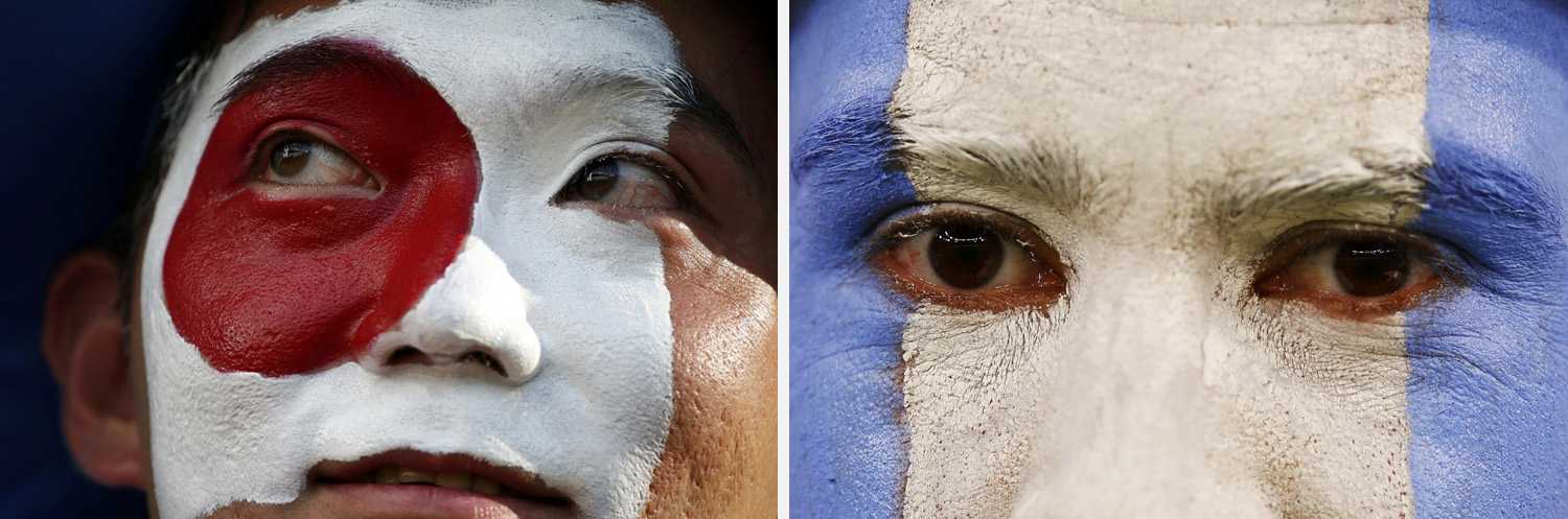 A fan of Argentina waits for the start of their 2014 World Cup Group F soccer match against Bosnia at the Maracana stadium in Rio de Janeiro