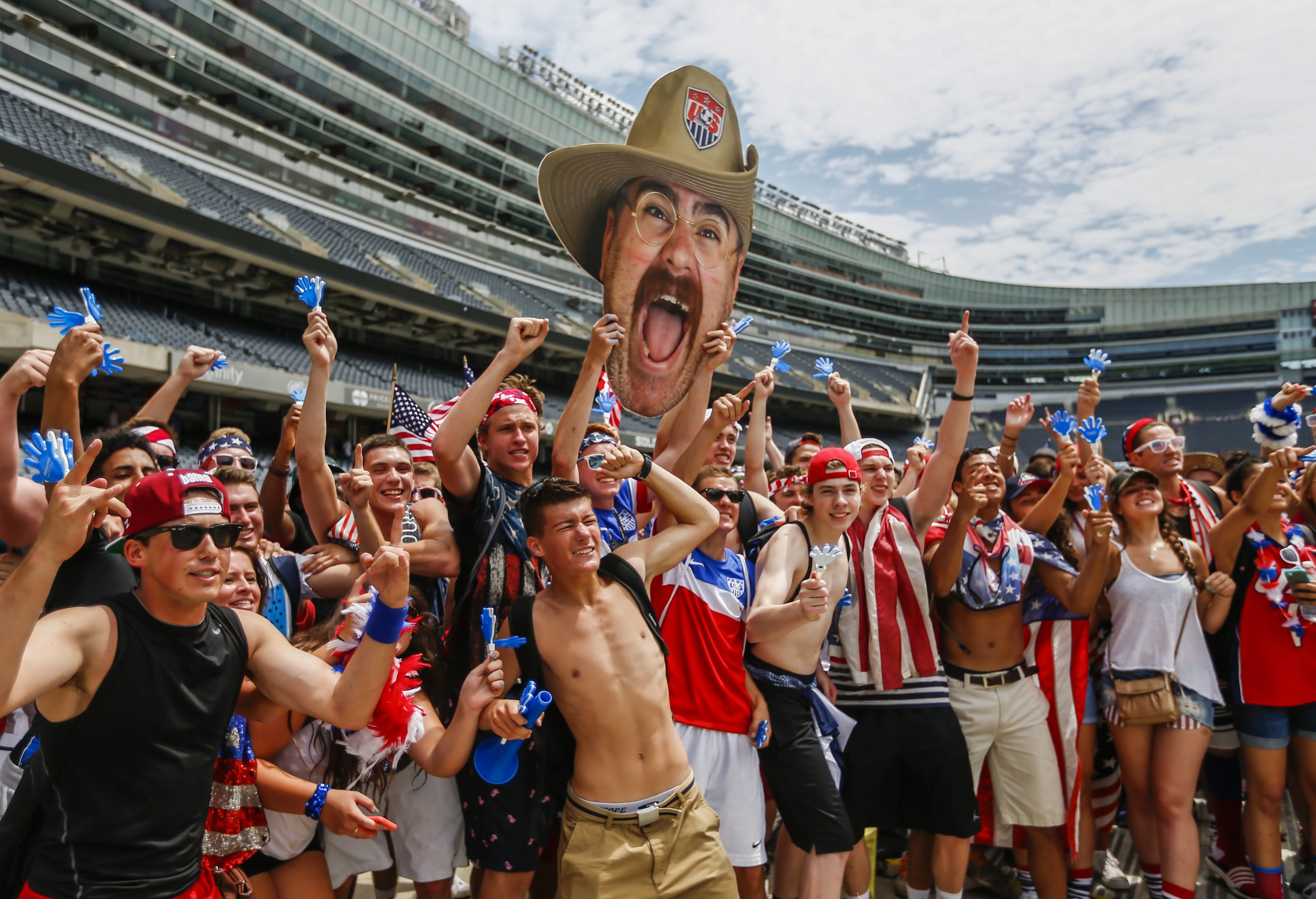 US fans cheer before the start of the match between the USA and Belgium played at the Arena Fonte Nova in Salvador, Brazil, at Soldier Field in Chicago, Illinois on  July 1, 2014.