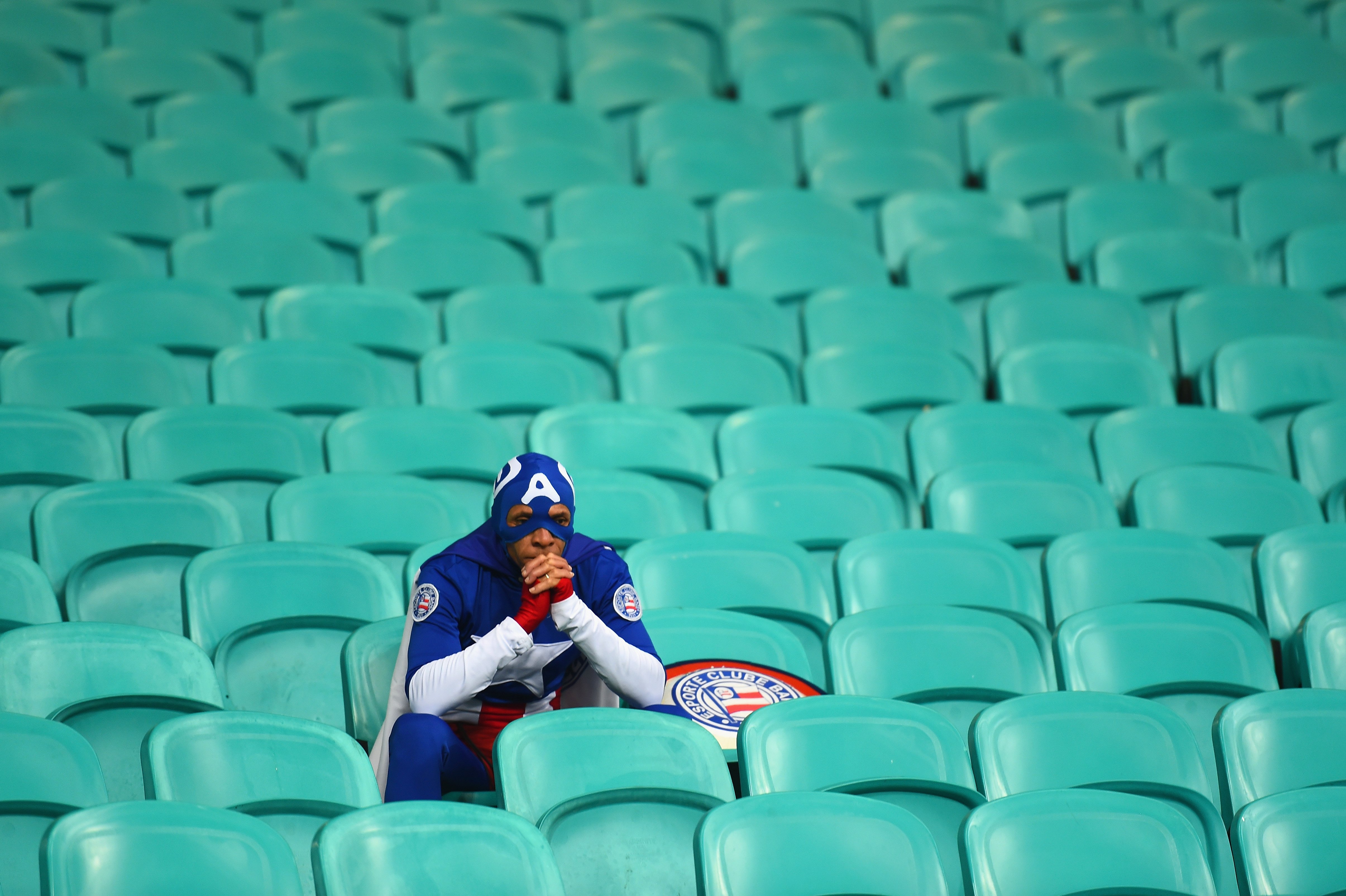 A fan dressed as Captain America looks on after Belgium's 2-1 victory in extra time during the match between Belgium and the United States at Arena Fonte Nova on July 1, 2014 in Salvador, Brazil.