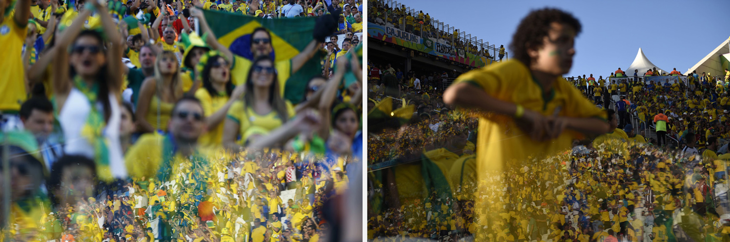 A reflection of cheering fans is seen before the 2014 World Cup opening match between Brazil and Croatia at the Corinthians arena in Sao Paulo
