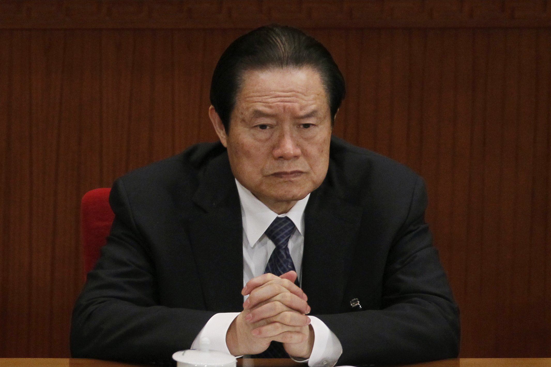 Zhou Yongkang, then Chinese Communist Party Politburo Standing Committee member in charge of security, attends a plenary session of the National People's Congress at the Great Hall of the People in Beijing on March 9, 2012 (Ng Han Guan—AP)