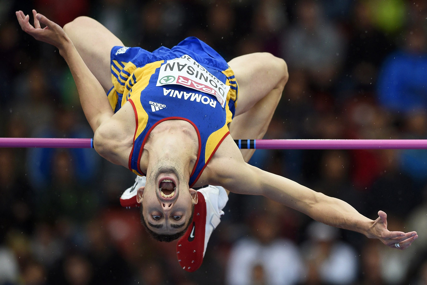 Aug. 13, 2014.  Mihai Donisan from Romania competes in the men's High Jump qualifying event during the European Athletics Championships 2014 in the Letzigrund Stadium in Zurich, Switzerland.