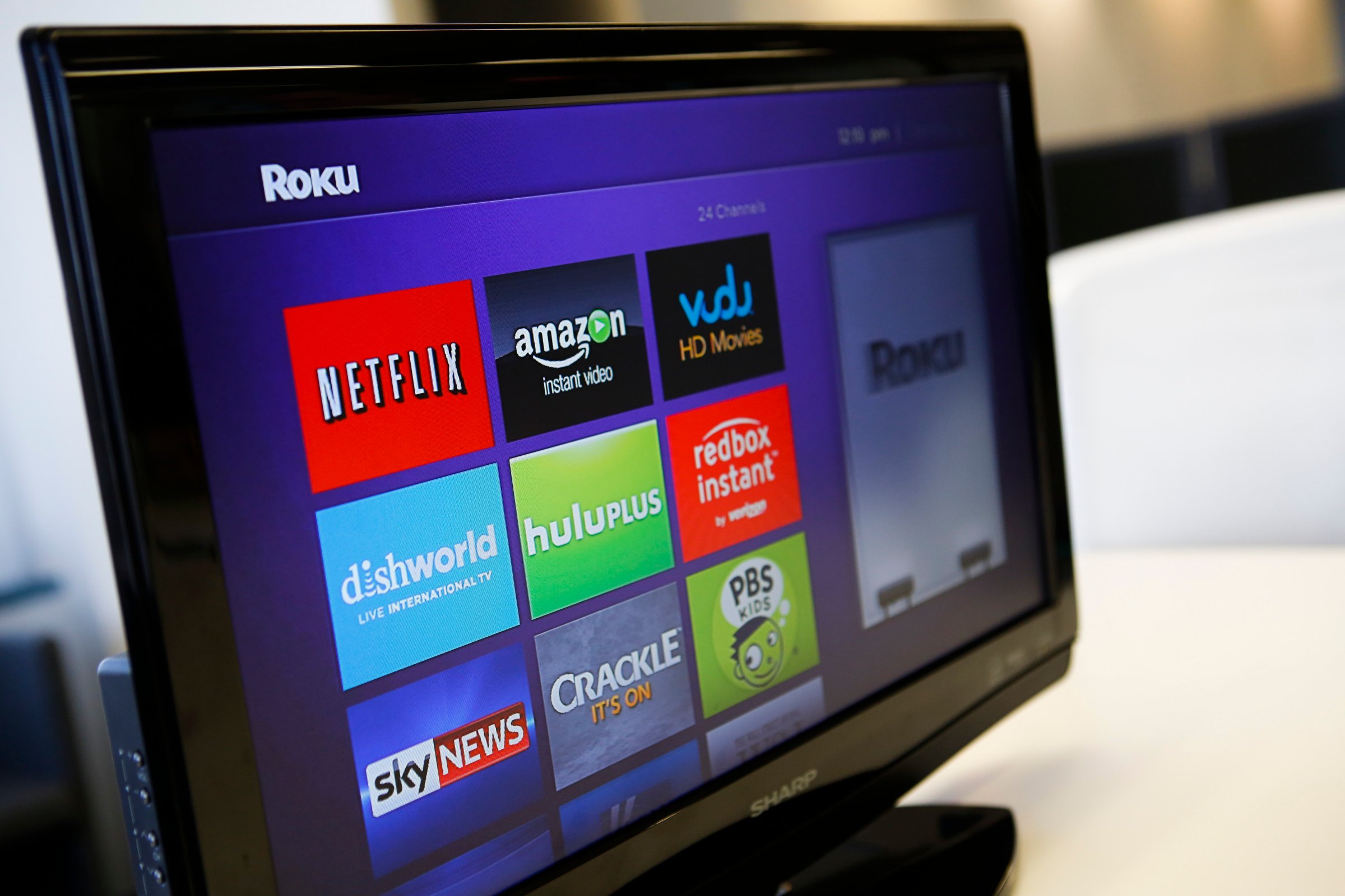 The Roku 3 television streaming player menu screen featuring Netflix, Amazon, Vudu, Hulu, and Redbox Instant is shown on a television in Los Angeles on Sept. 12, 2013.