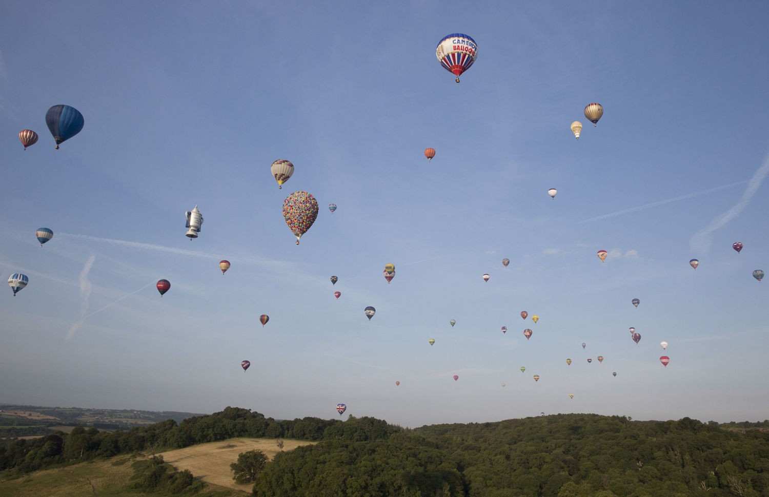 Aug. 8, 2014.   Balloons rise into the sky at the International Balloon Fiesta near Bristol in western England.
