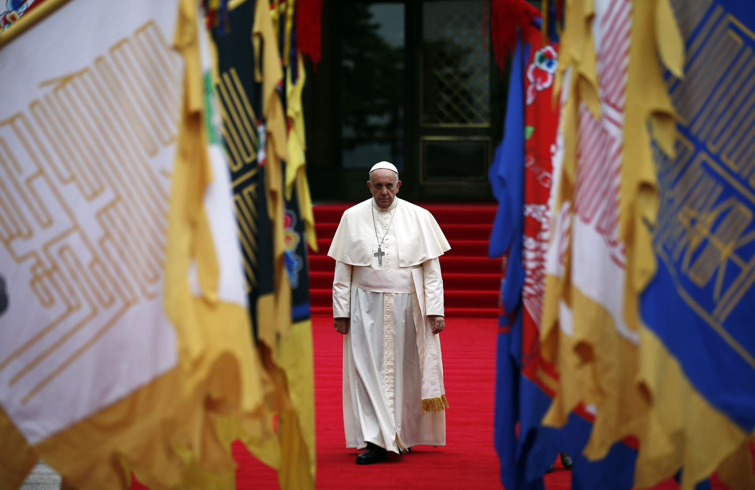 Aug. 14, 2014. Pope Francis arrives to attend a welcoming ceremony at the presidential Blue House in Seoul.