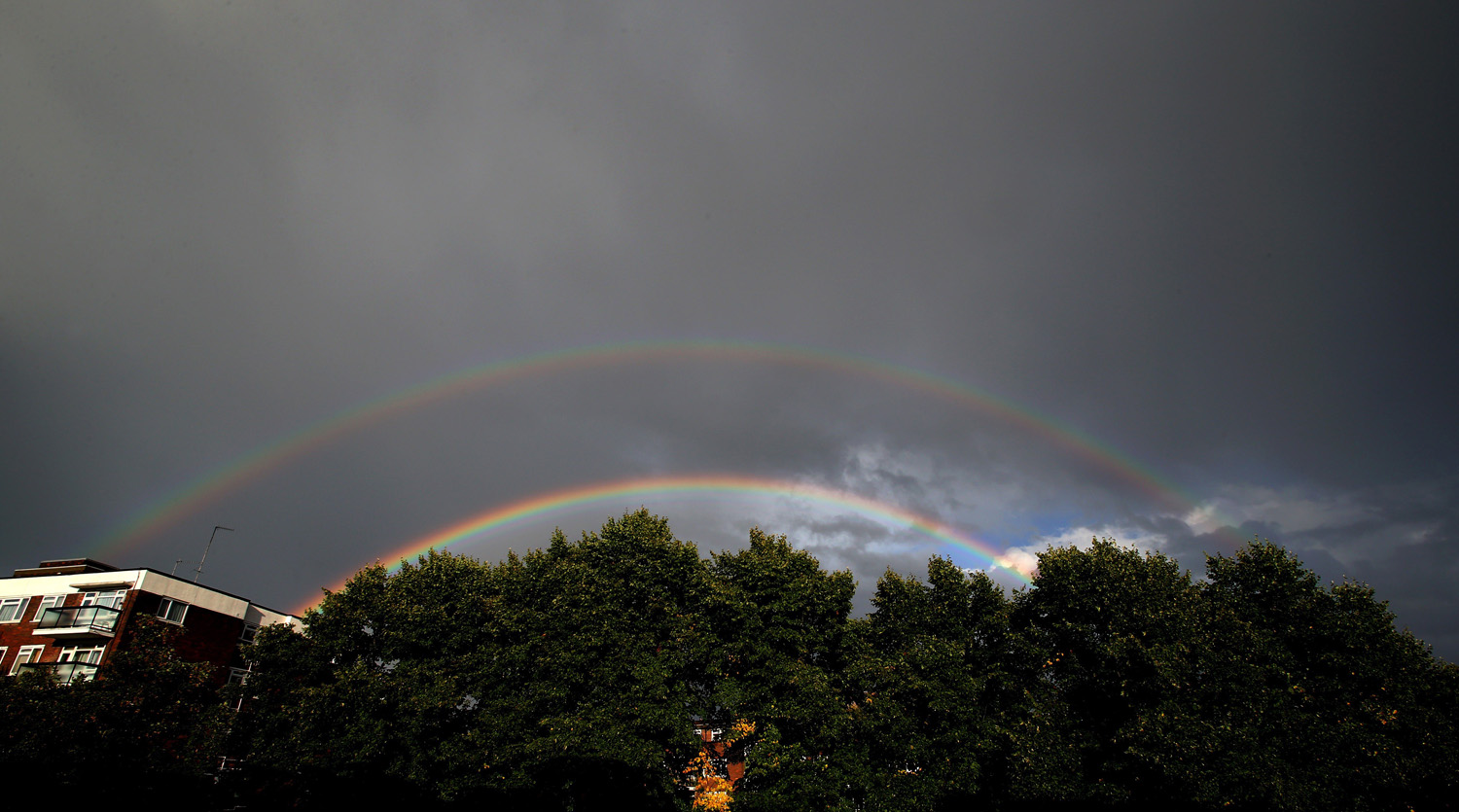 Double rainbows are seen after a heavy rain in London, UK on August 11, 2014.