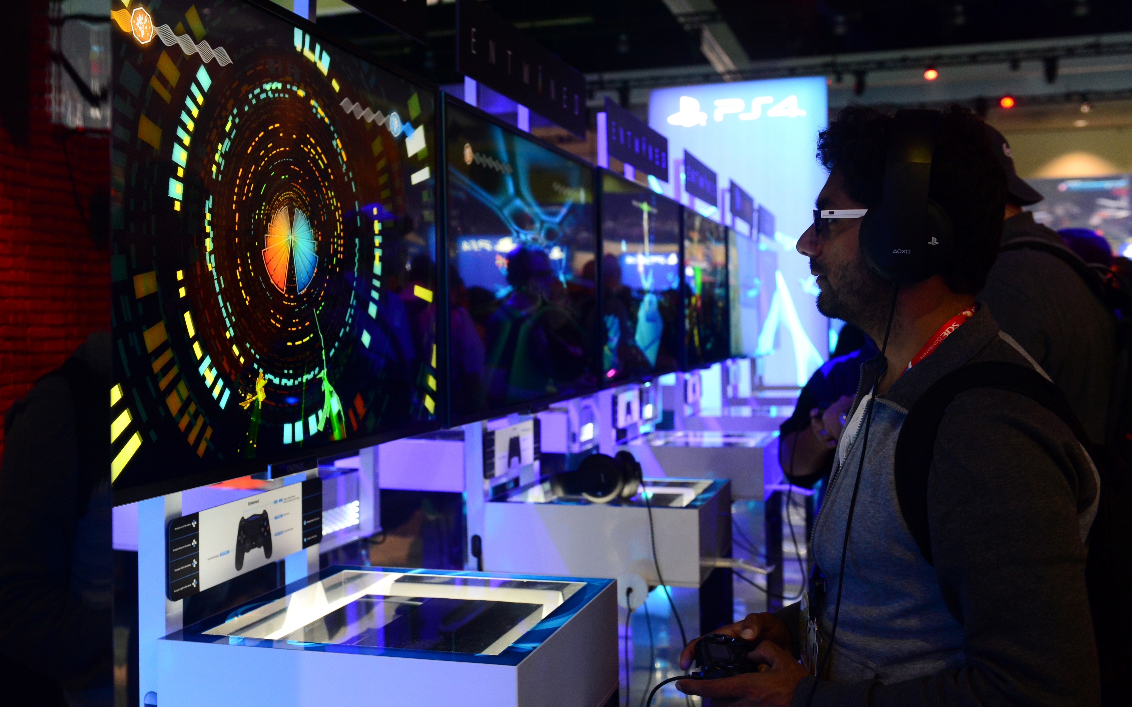 A gamer plays 'Entwined' on Sony's PS4 at annual E3 video game extravaganza in Los Angeles on June 10, 2014. (Frederic J. Brown—Getty Images)