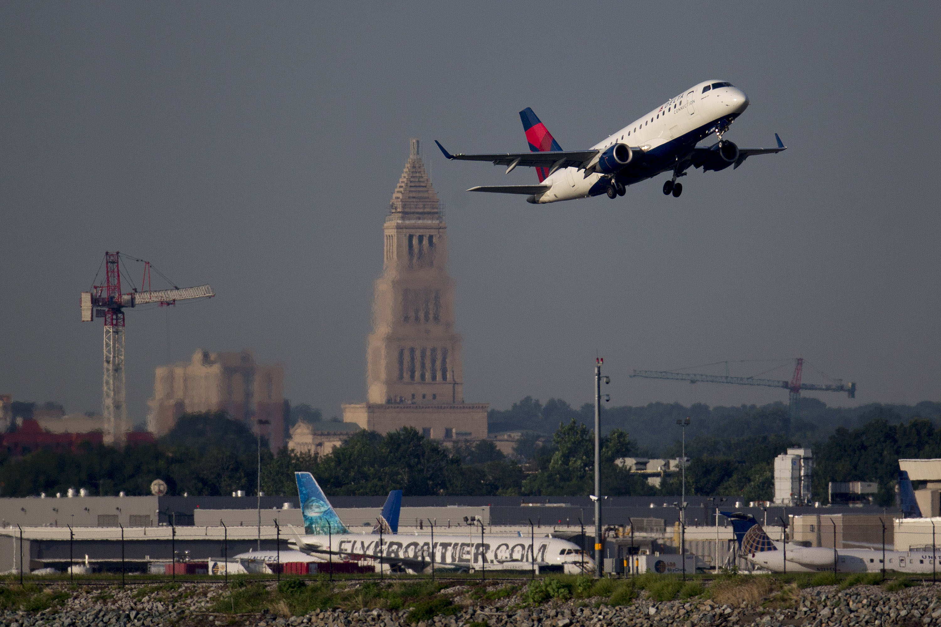 A Delta Air Lines Inc. airplane departs Ronald Reagan National Airport in Washington, D.C., U.S., on Friday, July 18, 2014. (Bloomberg—Bloomberg via Getty Images)