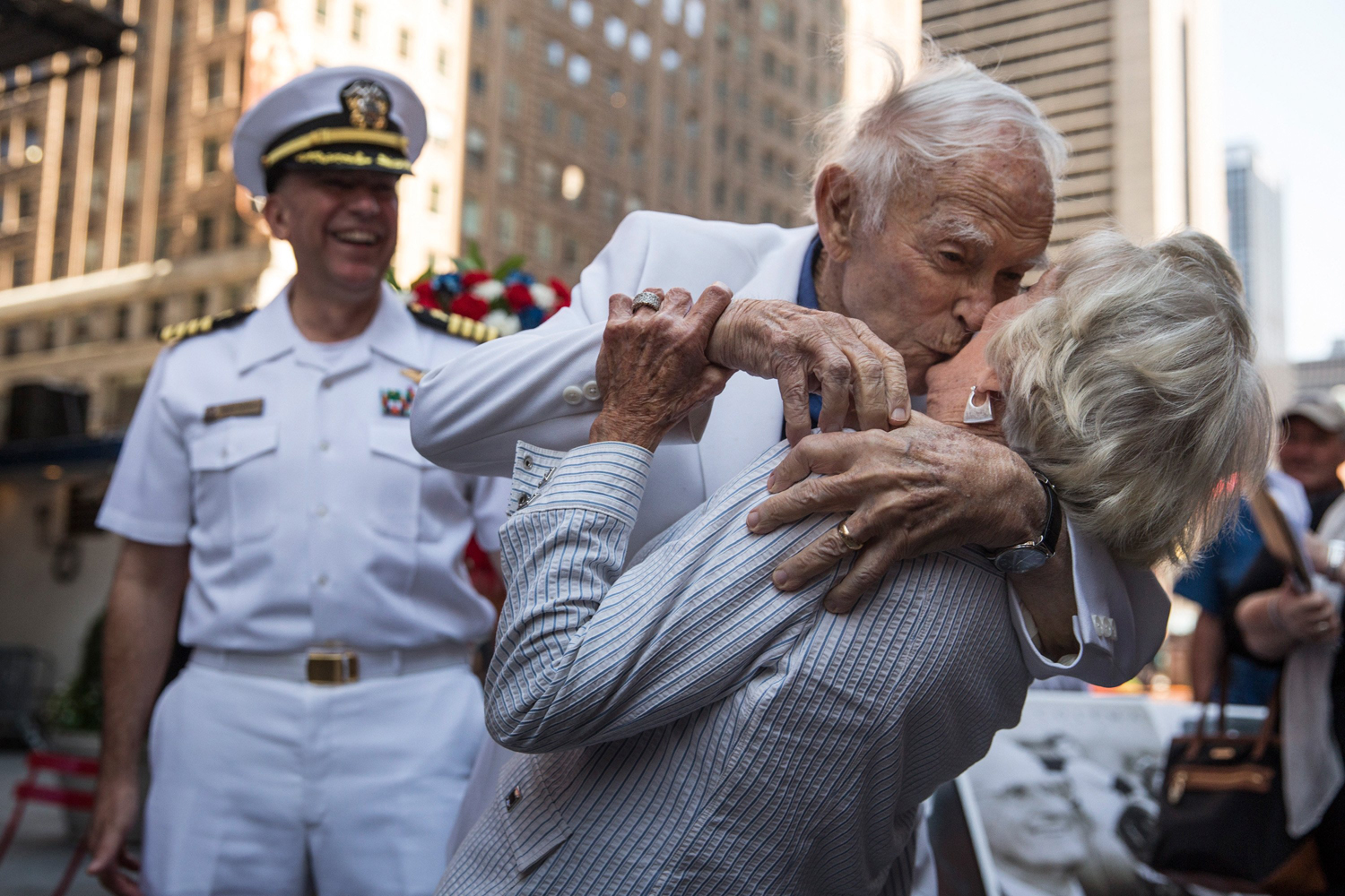 Aug. 14, 2014.  Sydnor Thompson, 90, kisses his wife, Harriette Thompson, 91, while reenacting the Times Square Kiss photo, taken by Alfred Eisenstaedt, to mark the 69-Anniversary of the end of World War Two and victory over Japan in Times Square in New York City.