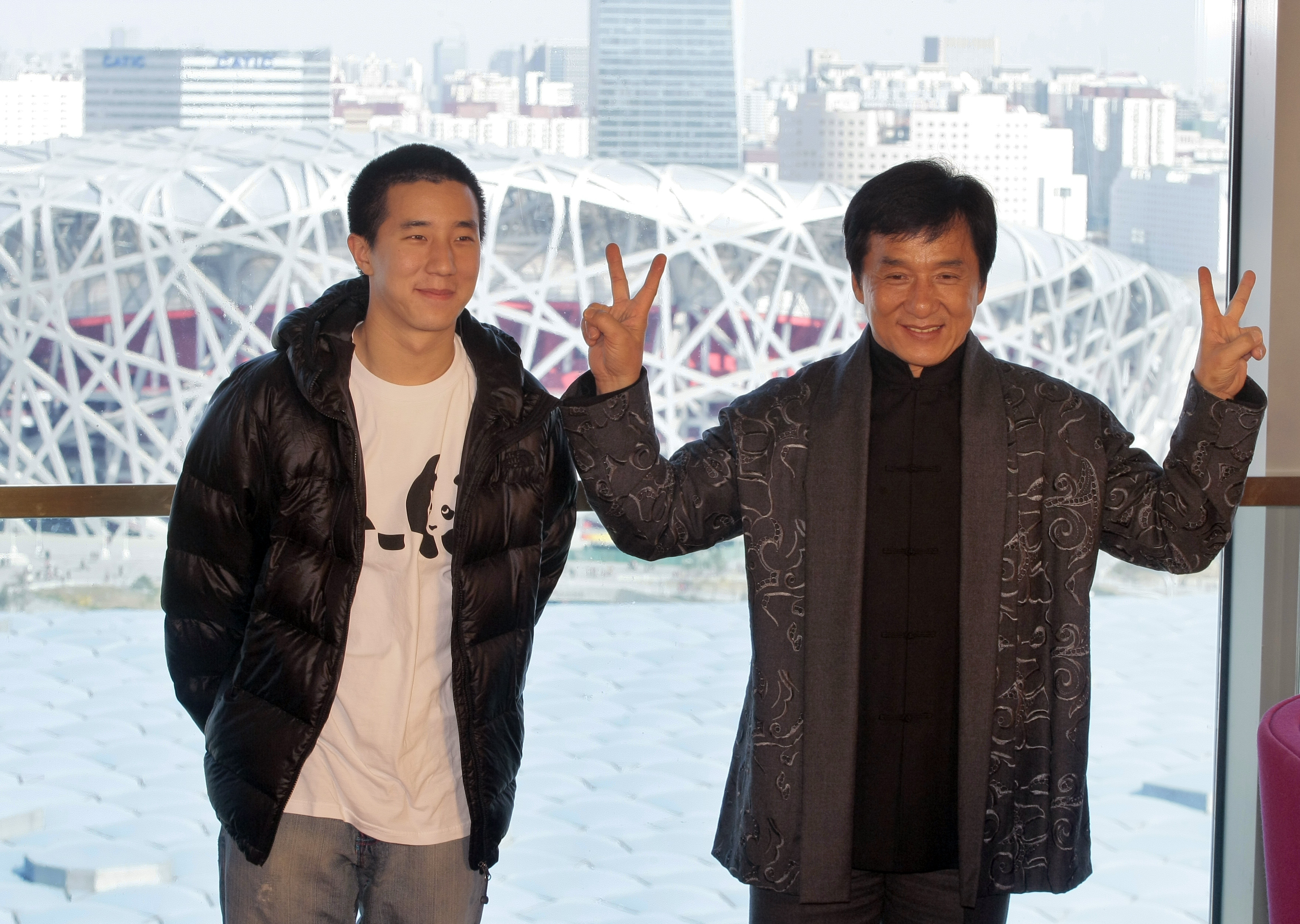 Jackie Chan and his son Jaycee Chan attend a press conference on April 1, 2009 in Beijing, China. (ChinaFotoPress/ChinaFotoPress via Getty Images)