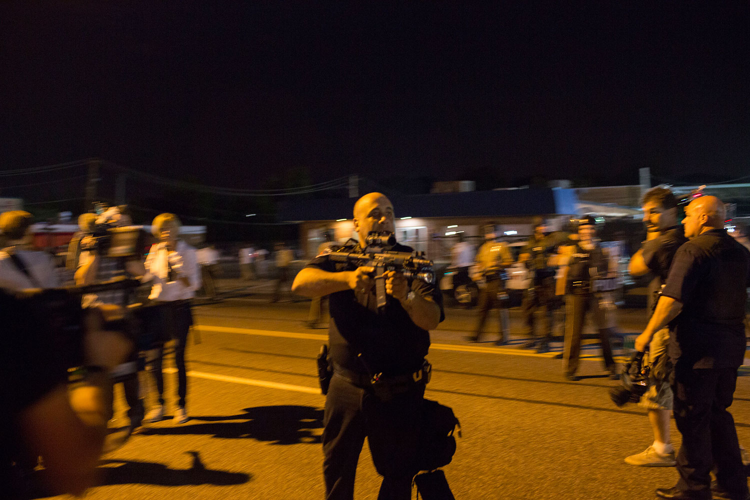 Cop Suspended Indefinitely After Threatening To Kill Ferguson Protestor