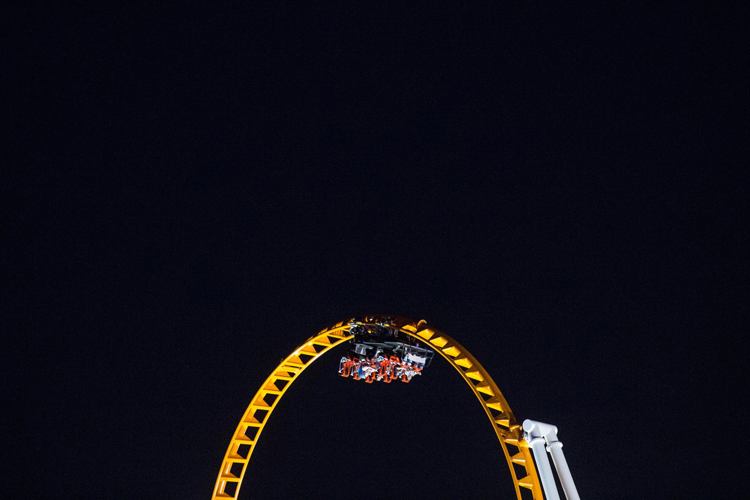 People enjoy a roller coaster at Coney Island in New York City on Aug. 26, 2014.