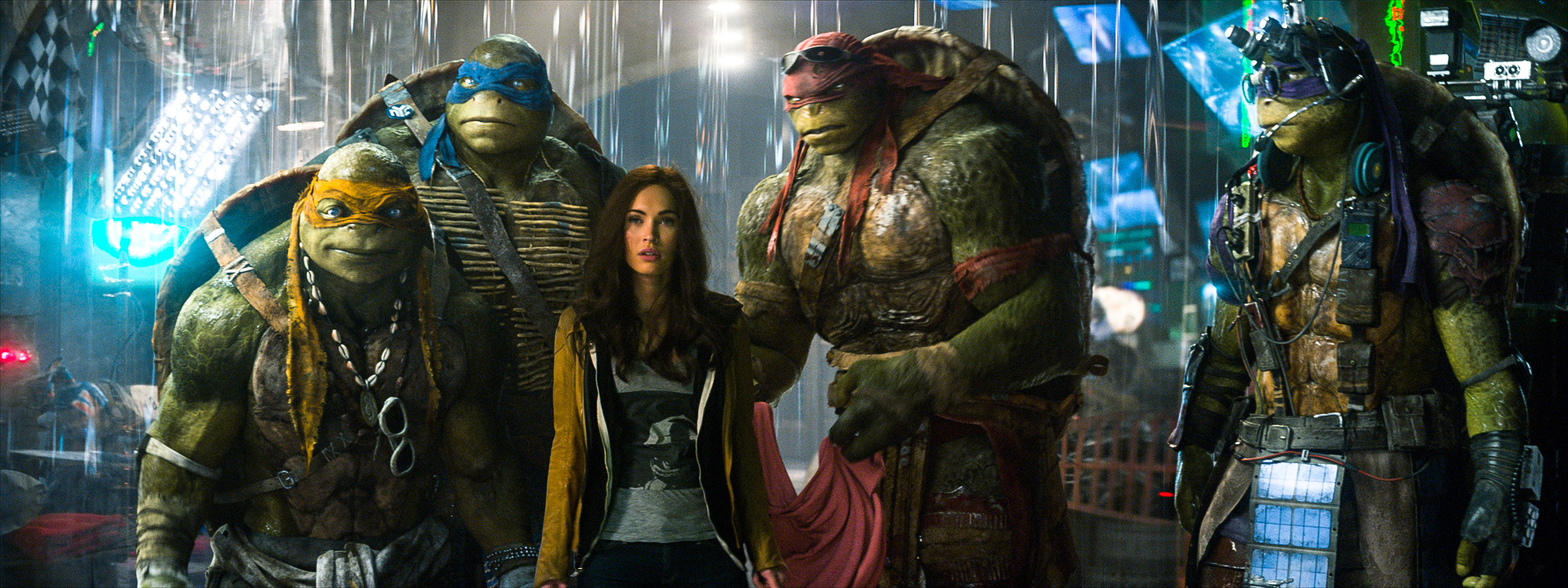 Megan Fox stars as April O'Neil in <i>Teenage Mutant Ninja Turtles</i> alongside (L-R) Michelangelo, Leonardo, Raphael and Donatello. (Industrial Light & Magic / Paramount)