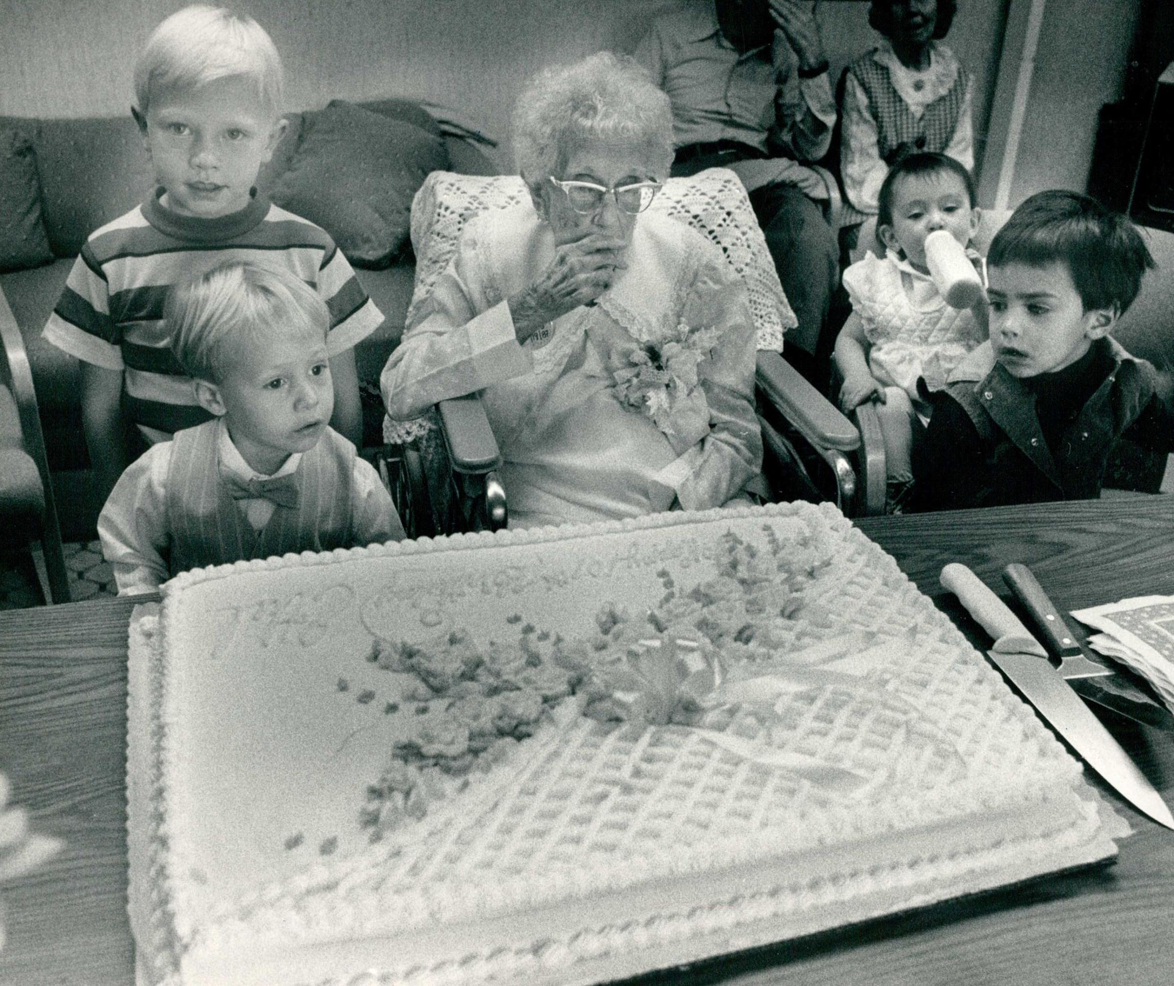 Ethel Lang celebrates her 107th birthday with her great great grandchildren on Sept. 21 1987 in the Bear Creek Nursing Home. Lang was born on May 27, 1900.