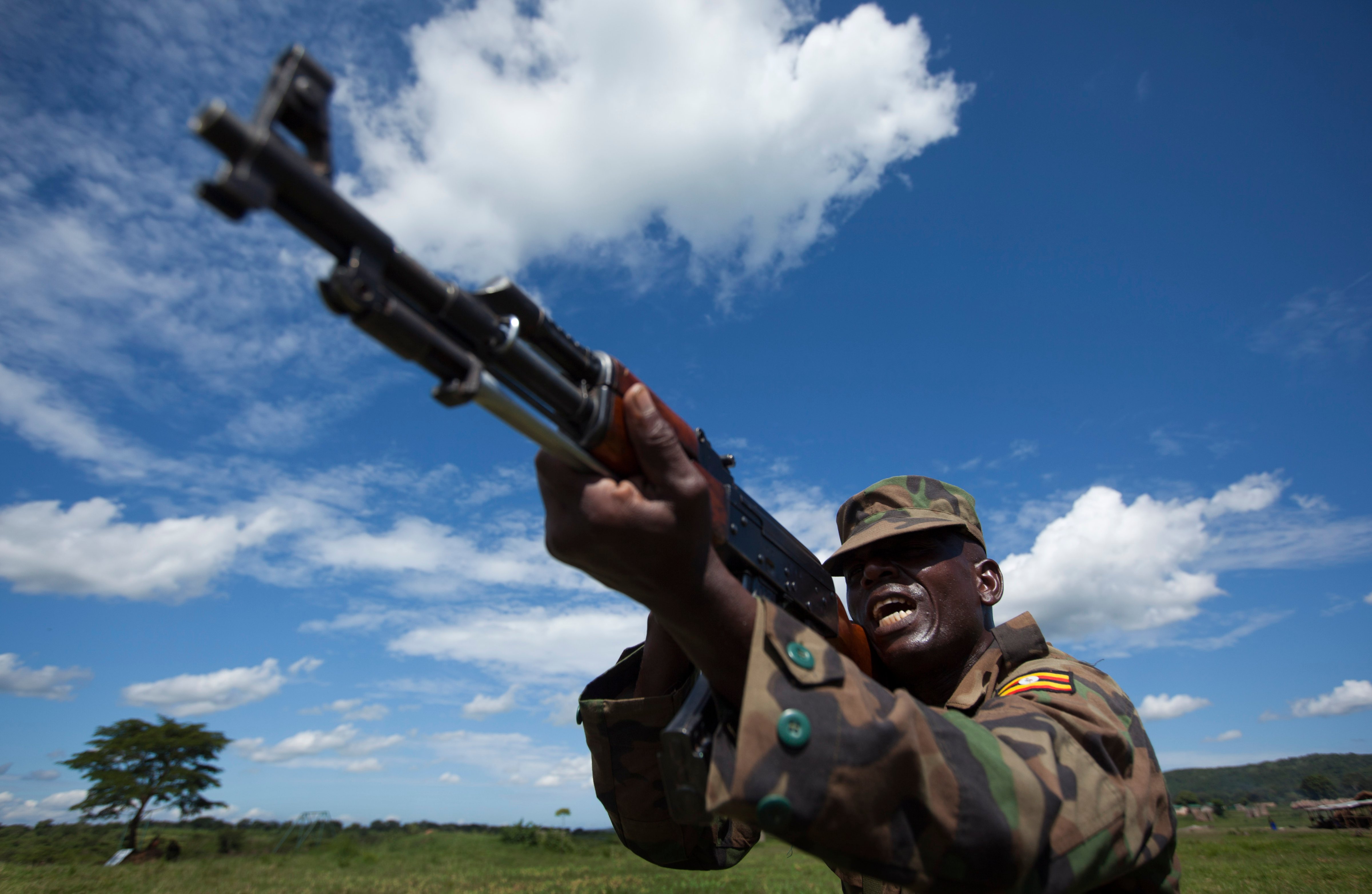A soldier from the Uganda People's Defence Force (UPDF) engages in weapons training at the Singo training facility in Kakola, Uganda Monday, April 30, 2012. The camp provides different training courses run by the U.S. Marines and also by instructors contracted by the U.S. State Department. (Ben Curtis—ASSOCIATED PRESS)