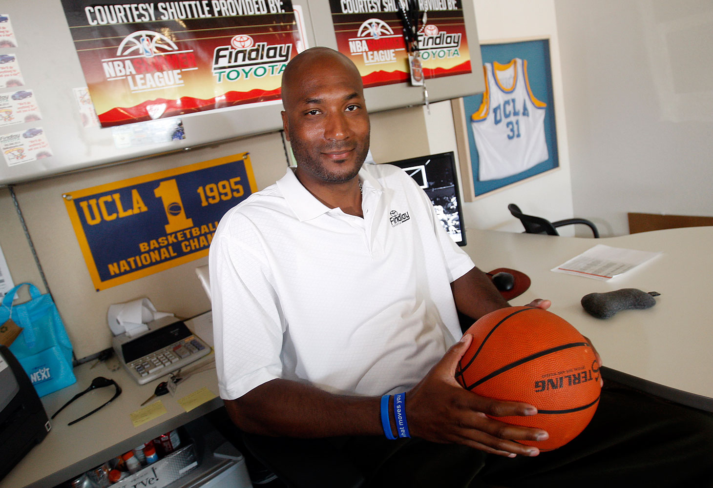 Former UCLA basketball player Ed O'Bannon Jr. sits in his office in Henderson, Nev., Sept. 18, 2010. (Isaac Brekken—AP)